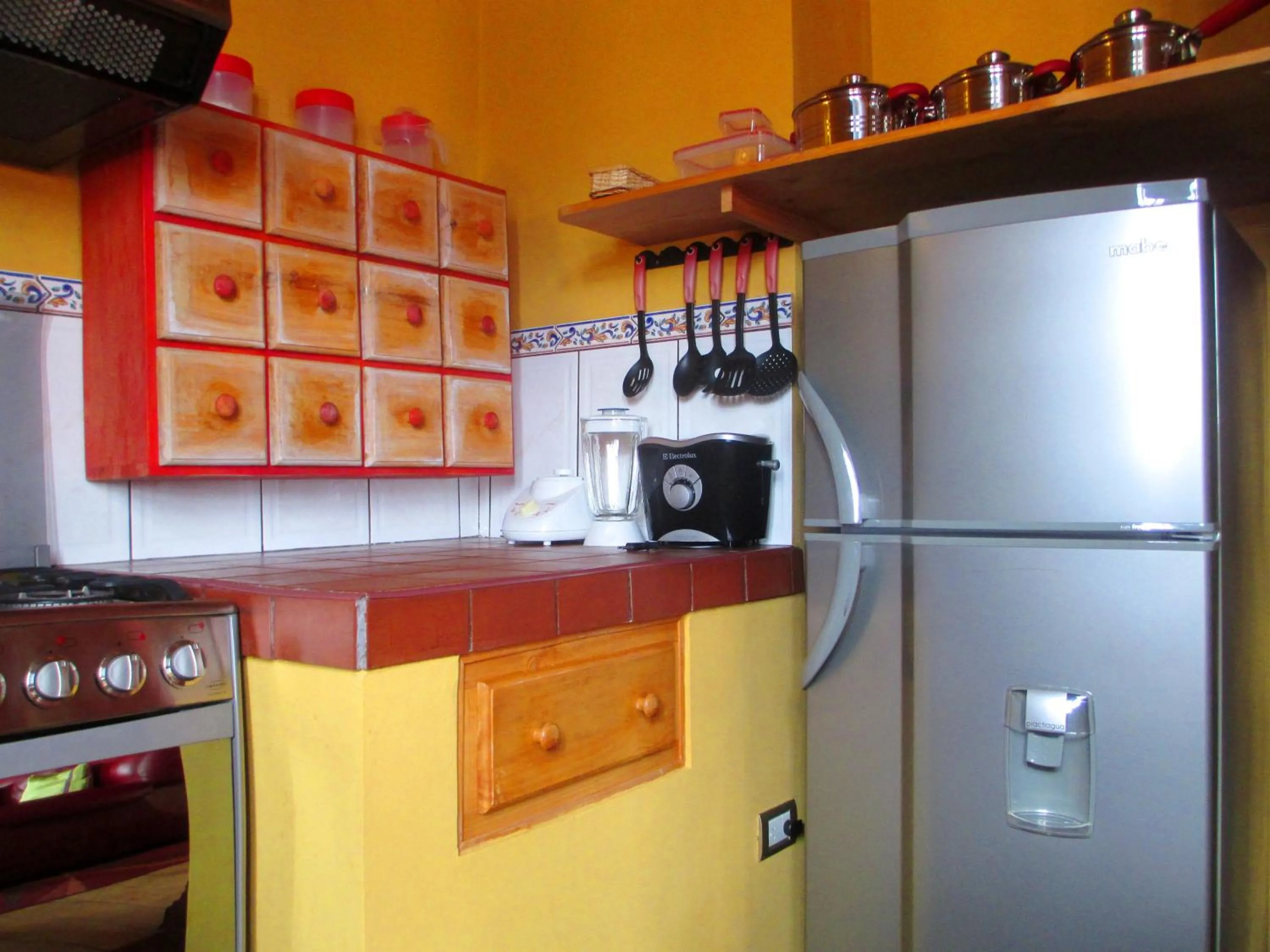 Kitchen or kitchenette in Quinua Boutique Apartments