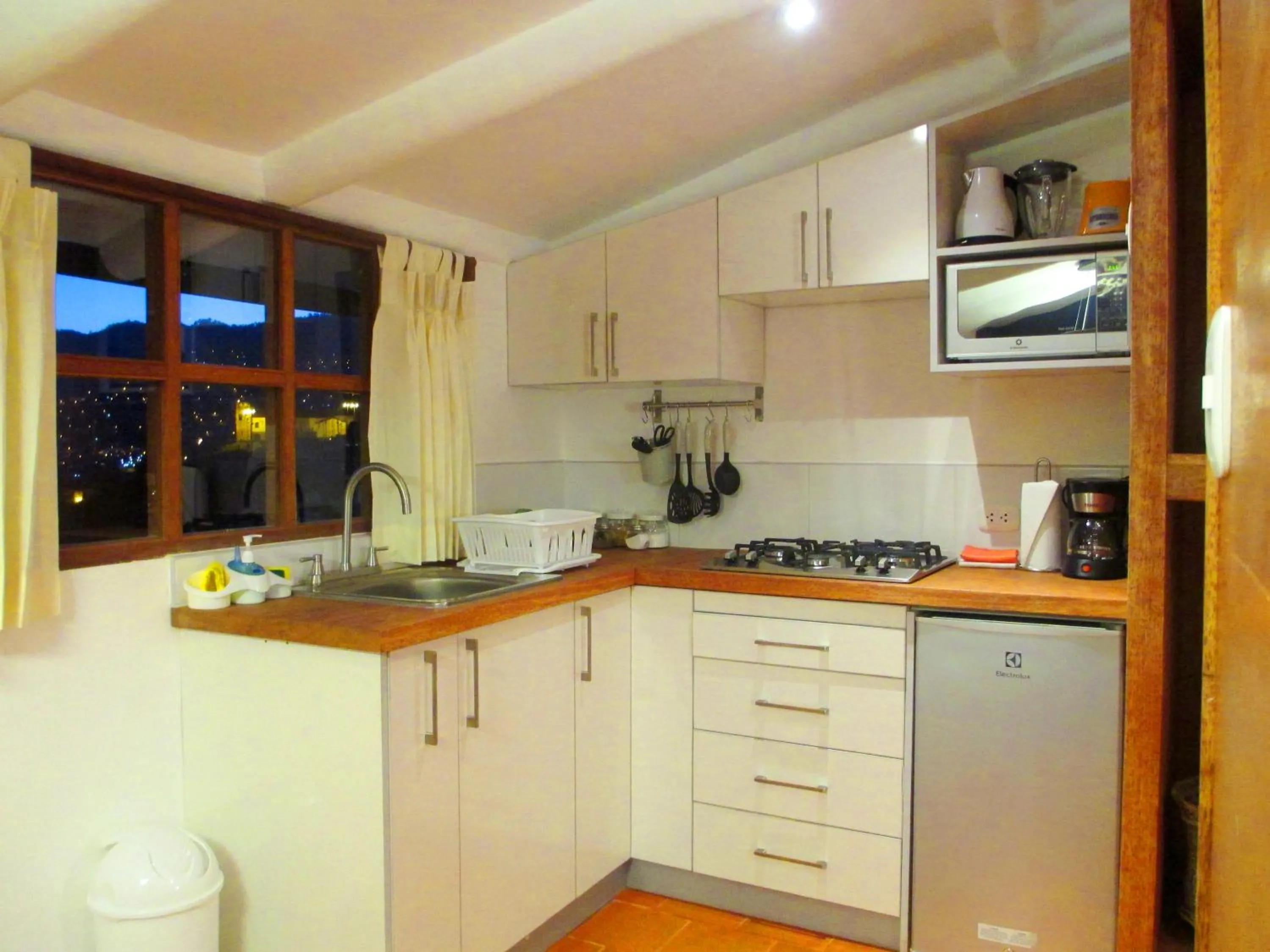 Kitchen or kitchenette in Quinua Boutique Apartments