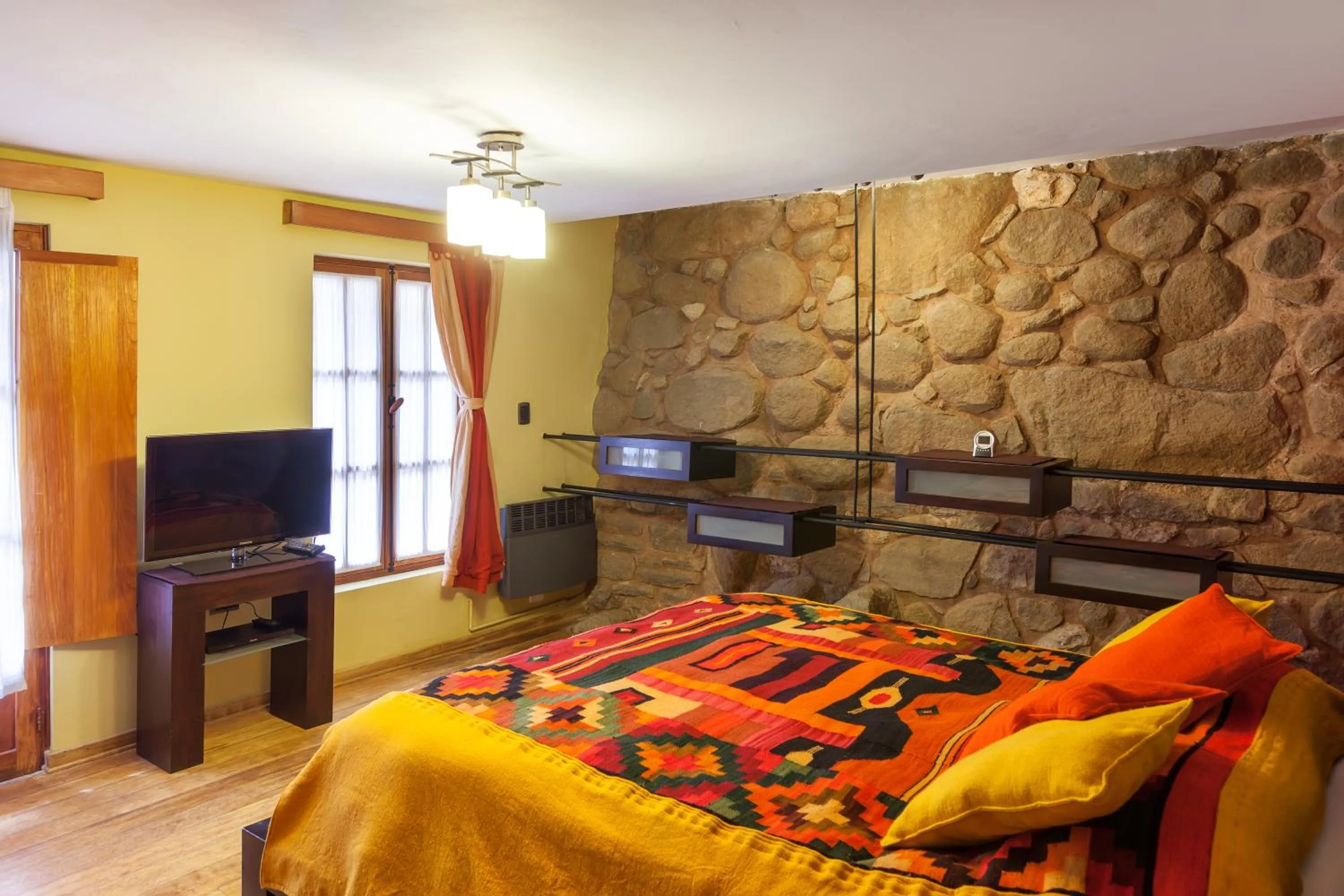 Bed in Quinua Boutique Apartments