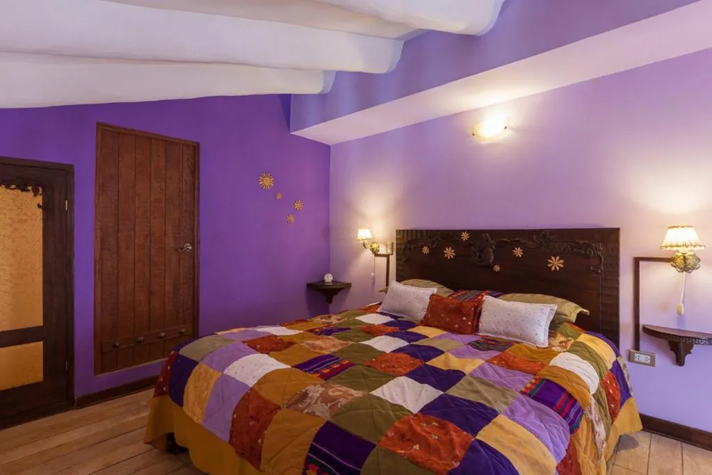 Bed in Quinua Boutique Apartments