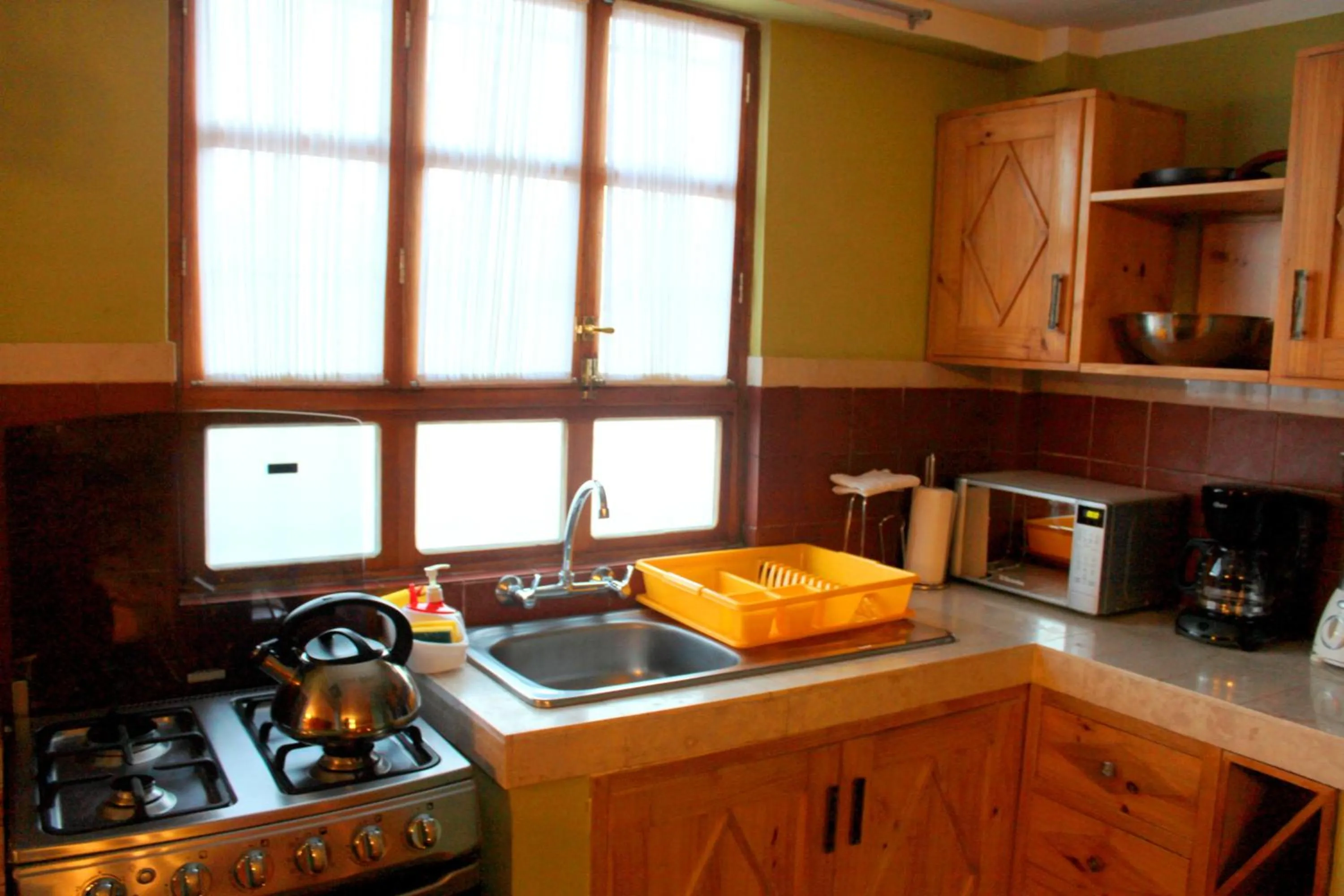 Kitchen or kitchenette in Quinua Boutique Apartments