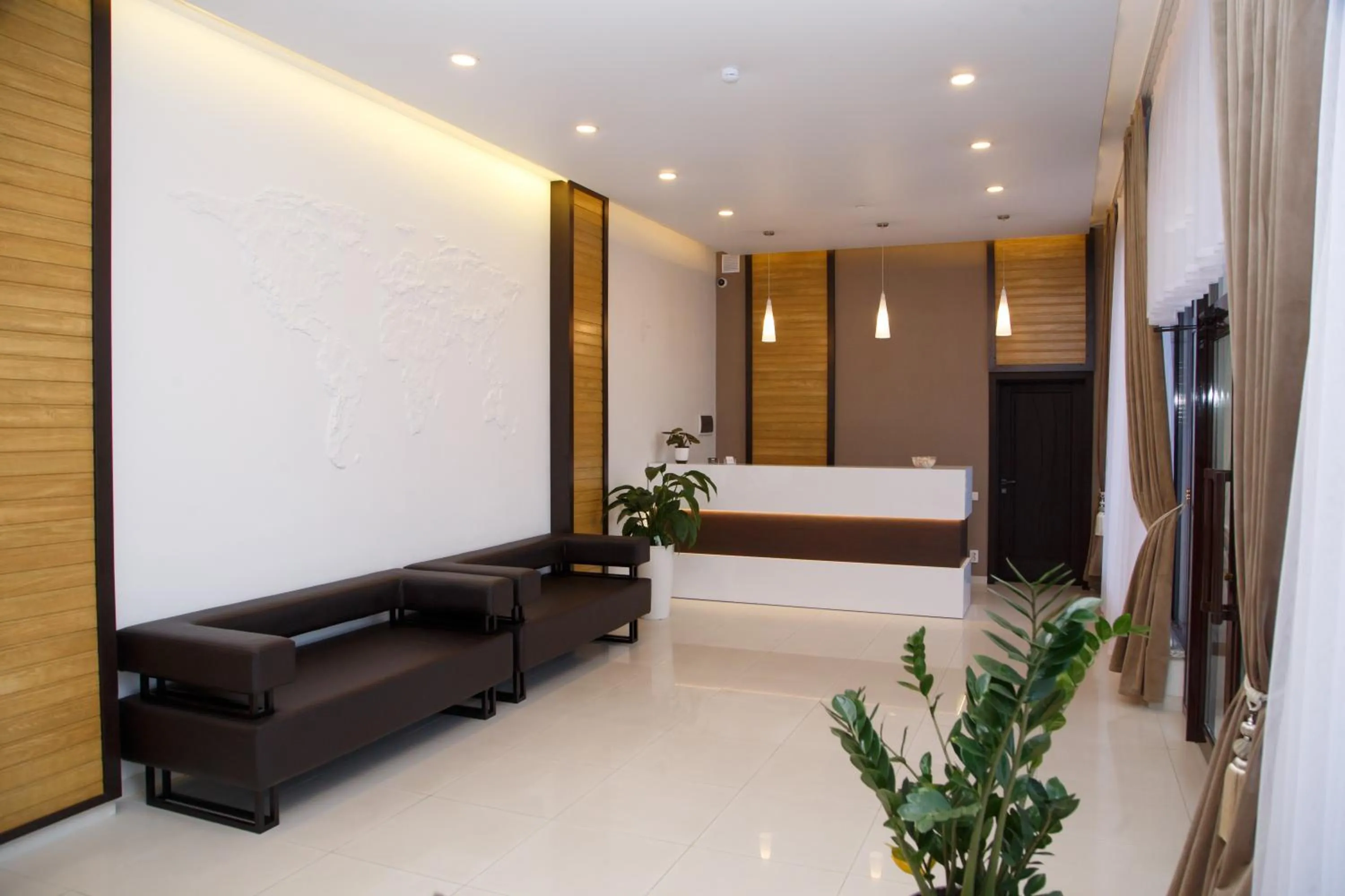 Living room, Bed in Lumarc Hotel