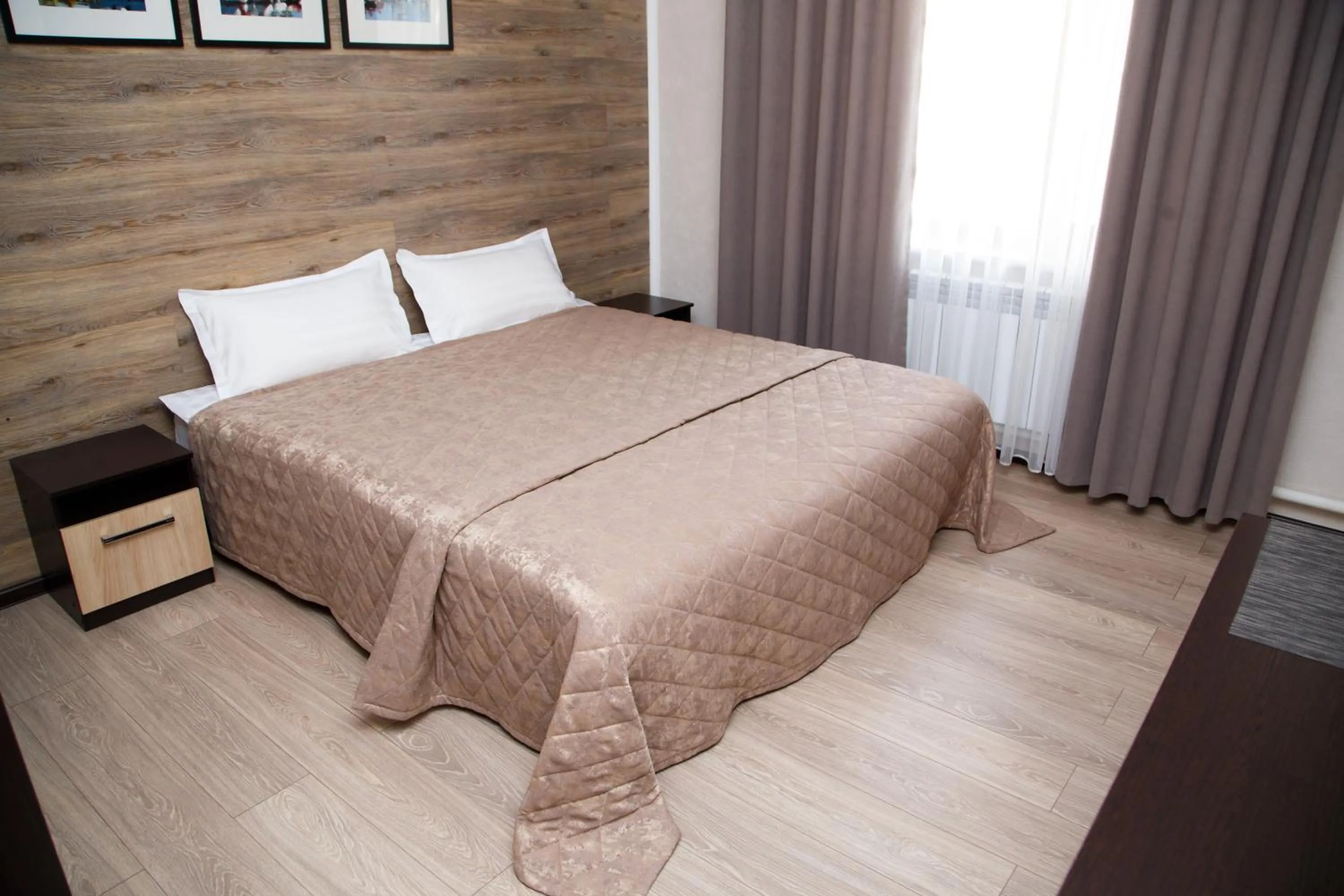 Bed in Lumarc Hotel