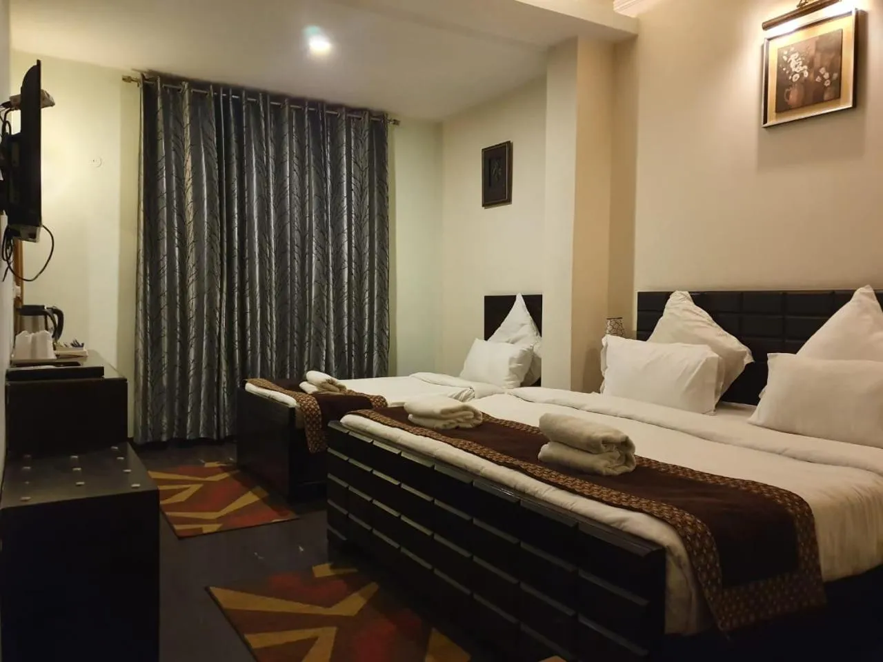 Bed in Hotel Corbett Kingdom