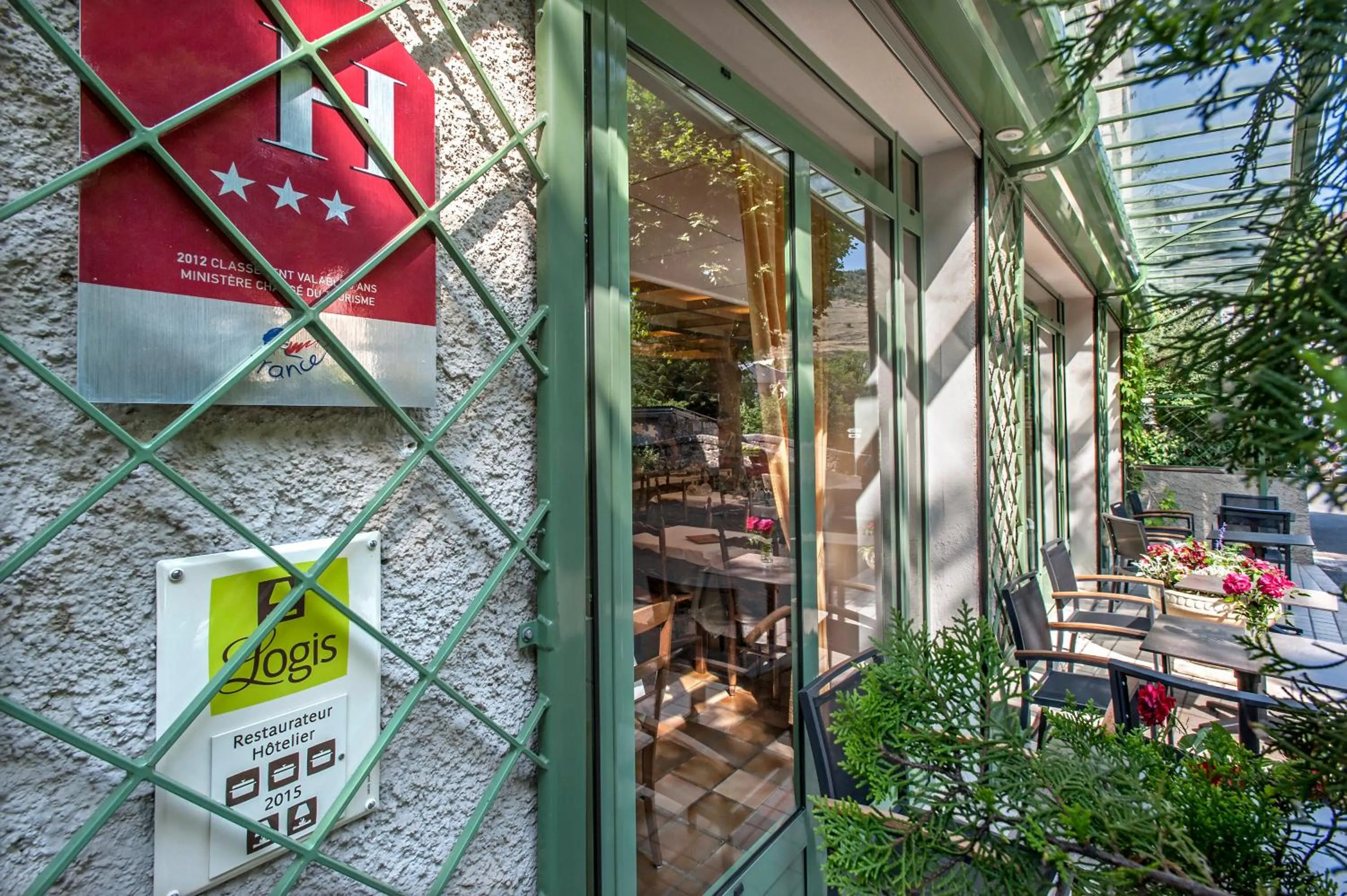 Patio in Logis Hôtel Restaurant Le Mont Aigoual