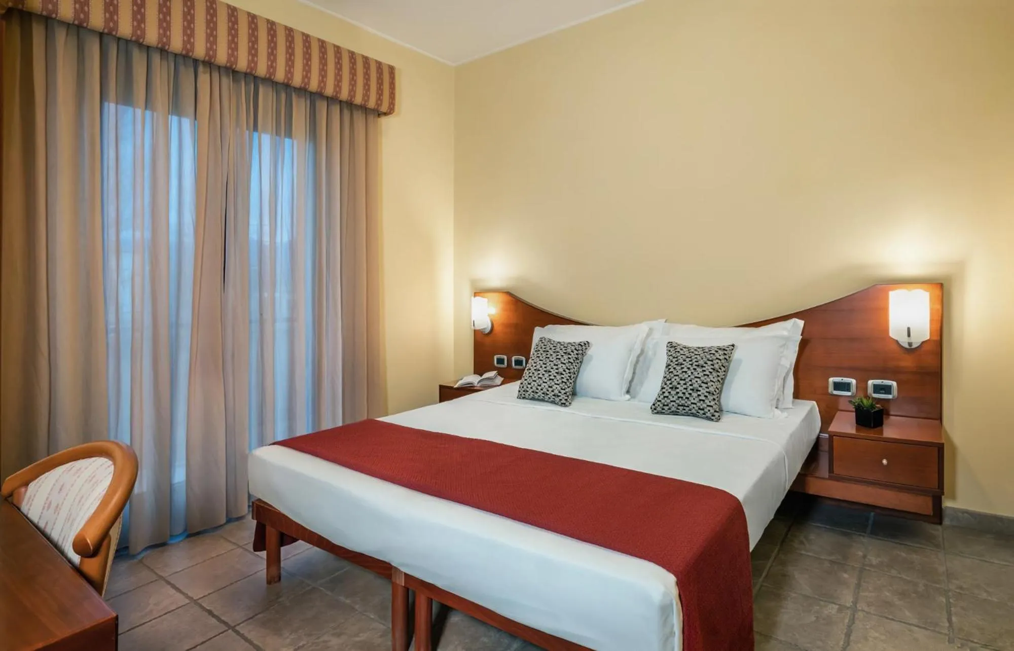 Bed in Hotel La Fenice