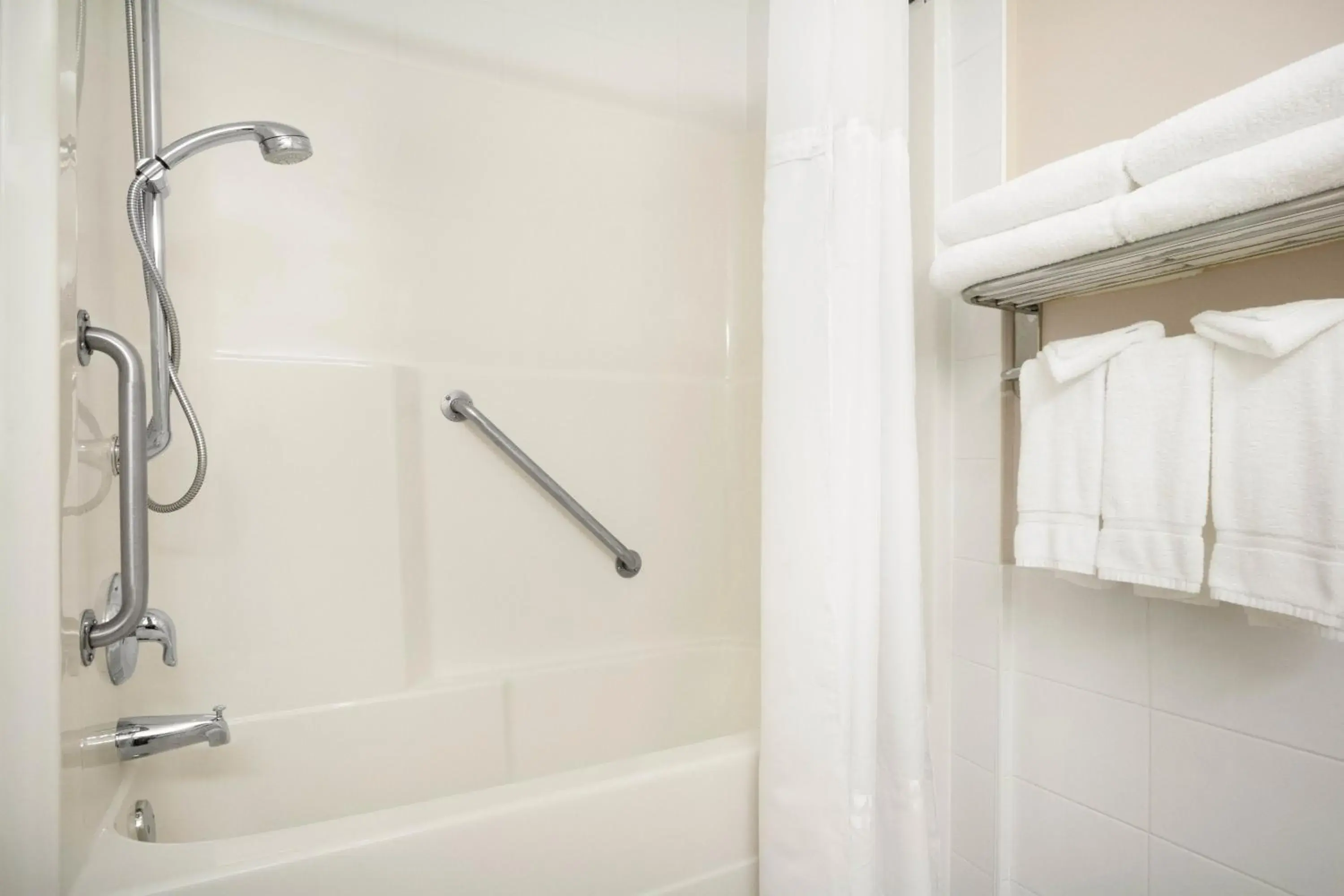 Bathroom in Days Inn & Suites by Wyndham Langley Bathroom in Days Inn & Suites by Wyndham Langley