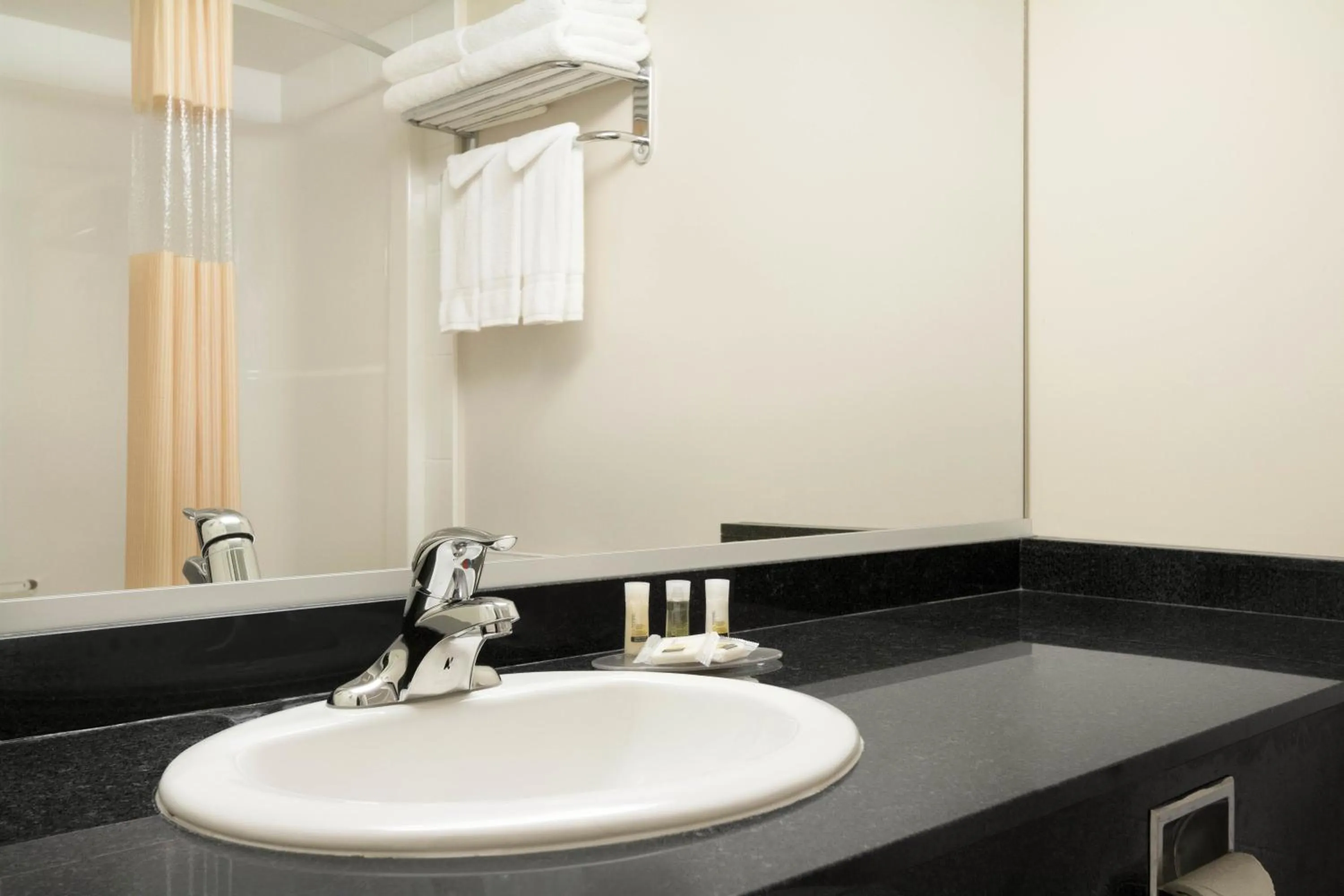 Bathroom in Days Inn & Suites by Wyndham Langley