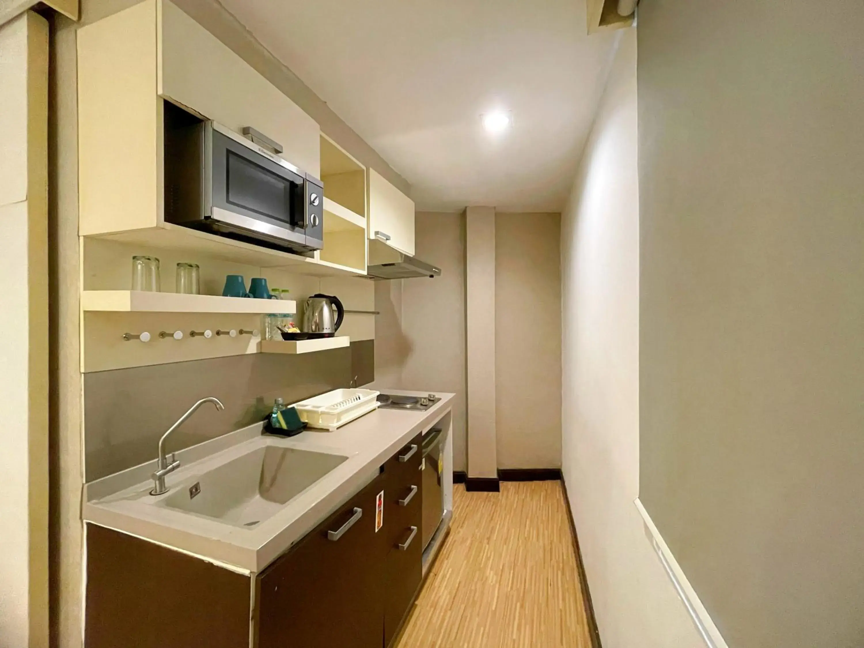 Kitchen or kitchenette in Arawana Express Phromphong Kitchen or kitchenette in Arawana Express Phromphong