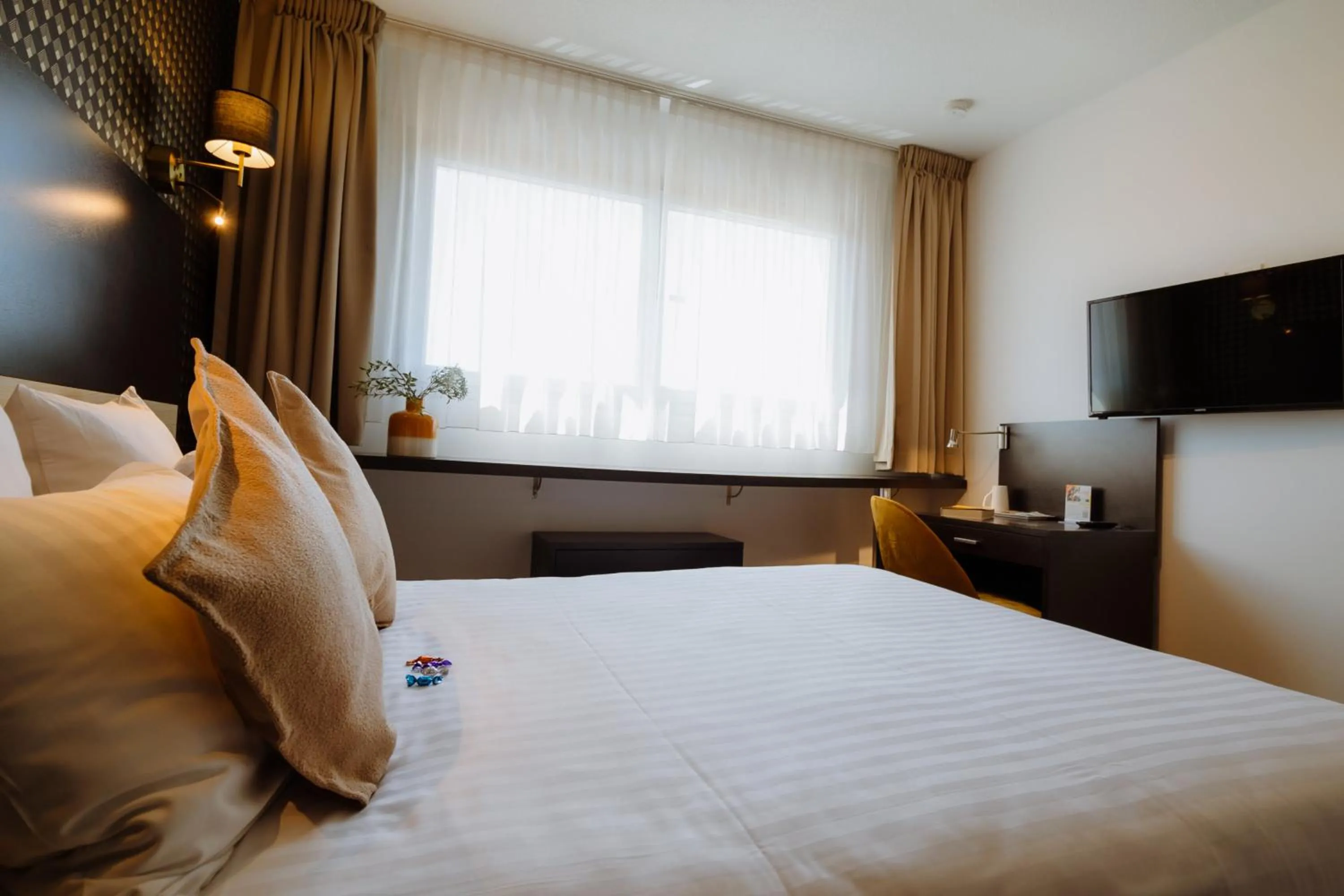 Bed in Clarion Aparthotel Toulouse Le Parc de l'Escale