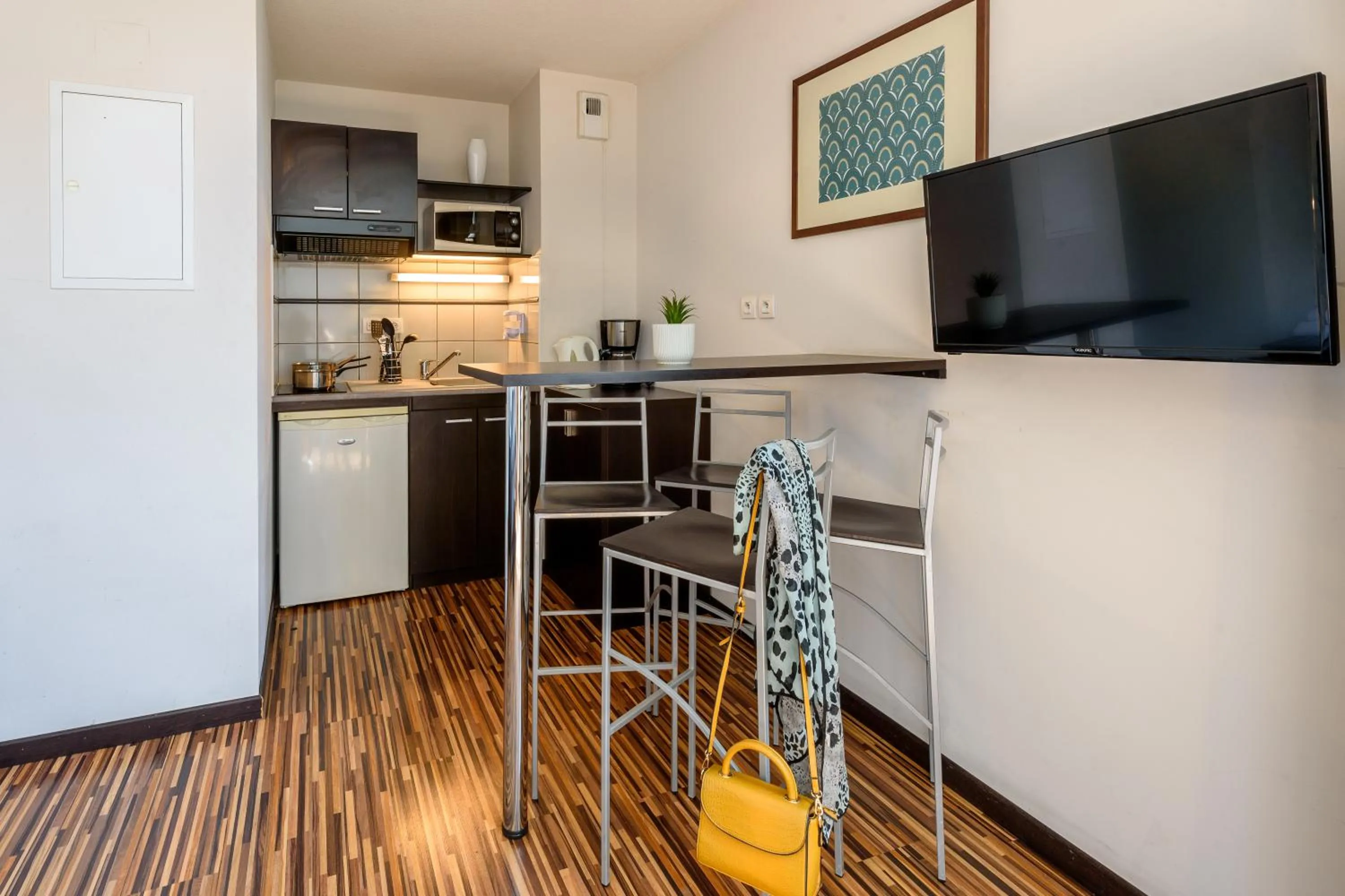 Kitchen or kitchenette in Clarion Aparthotel Toulouse Le Parc de l'Escale