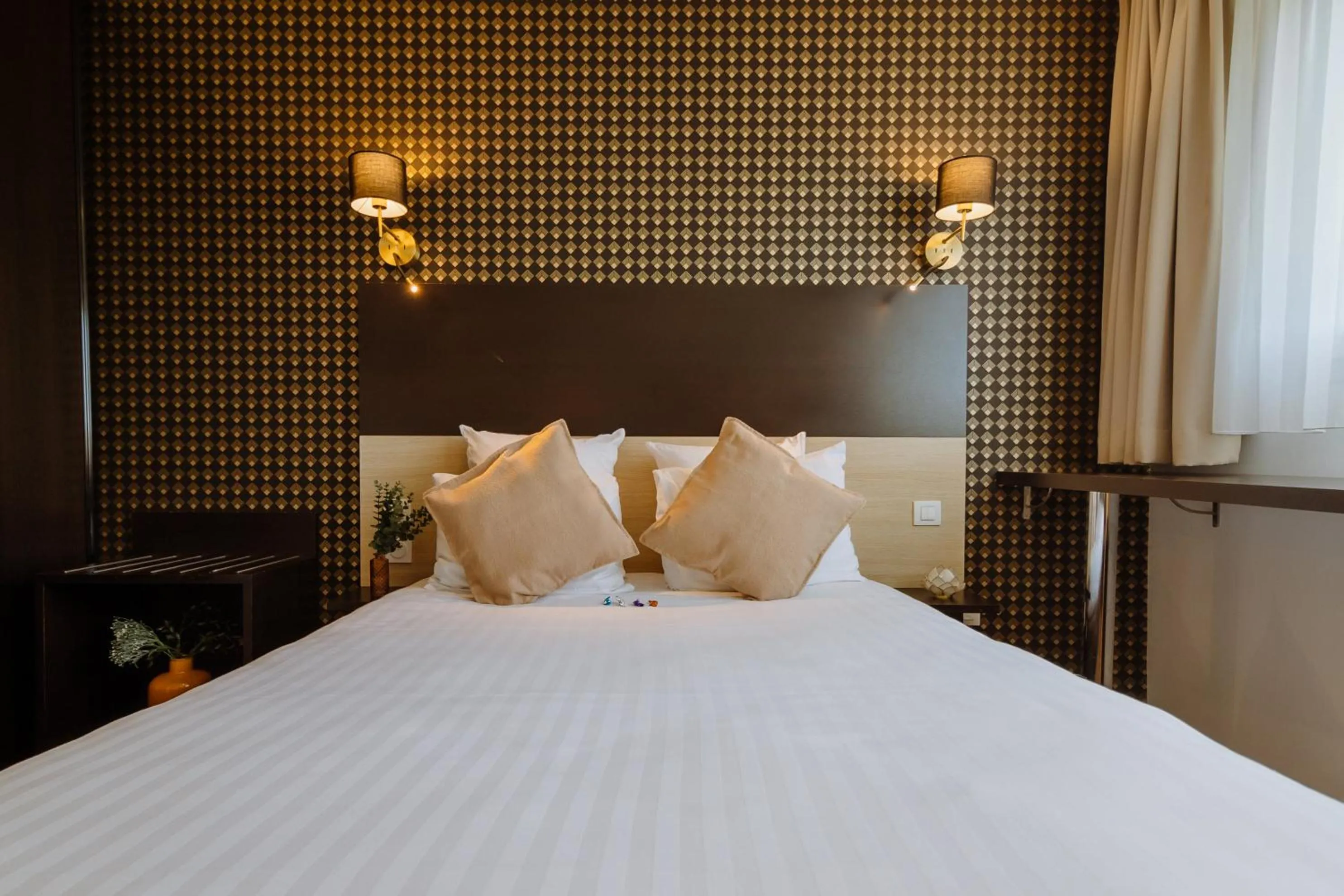 Bed in Clarion Aparthotel Toulouse Le Parc de l'Escale