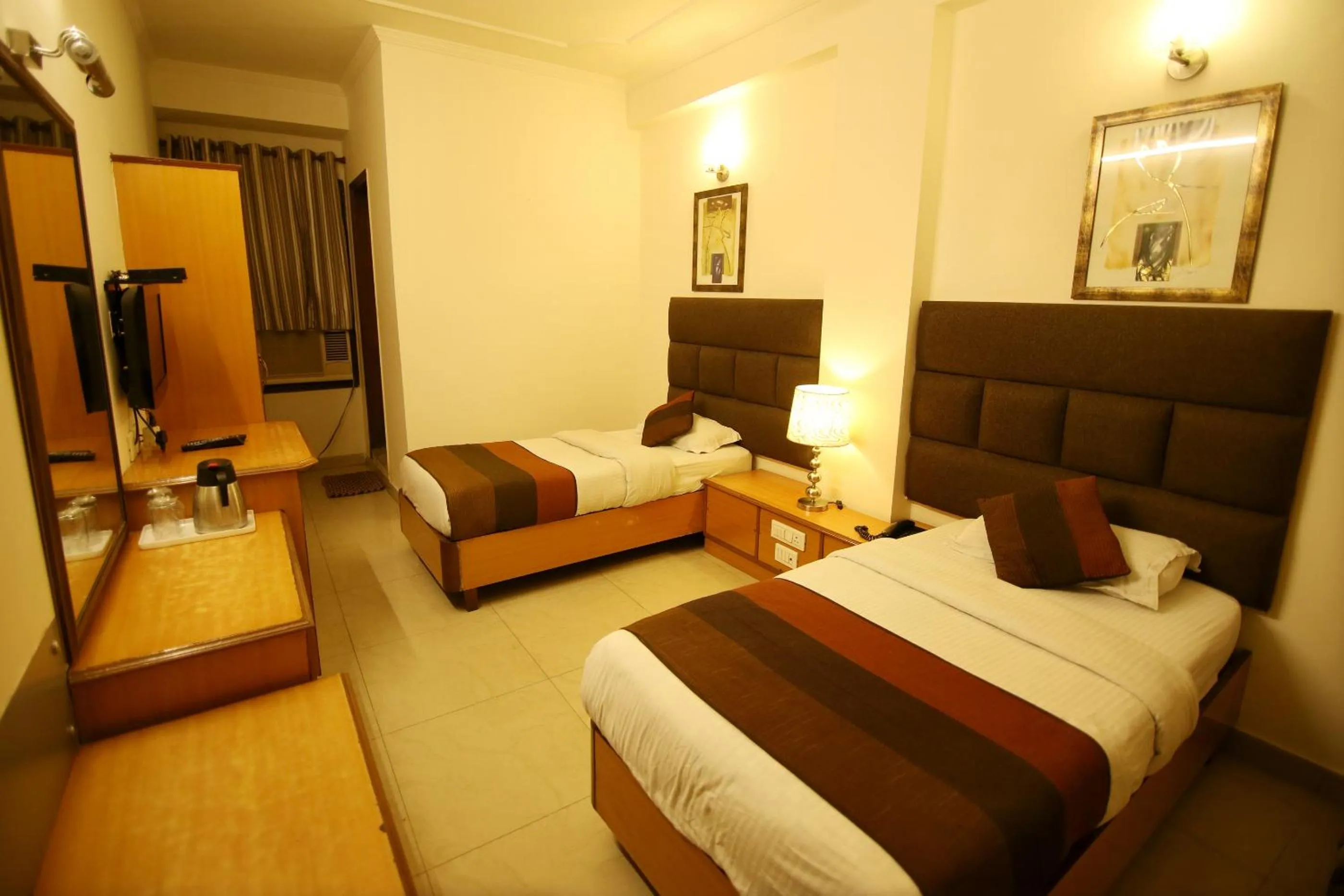 Bed in Hotel Parkway Deluxe