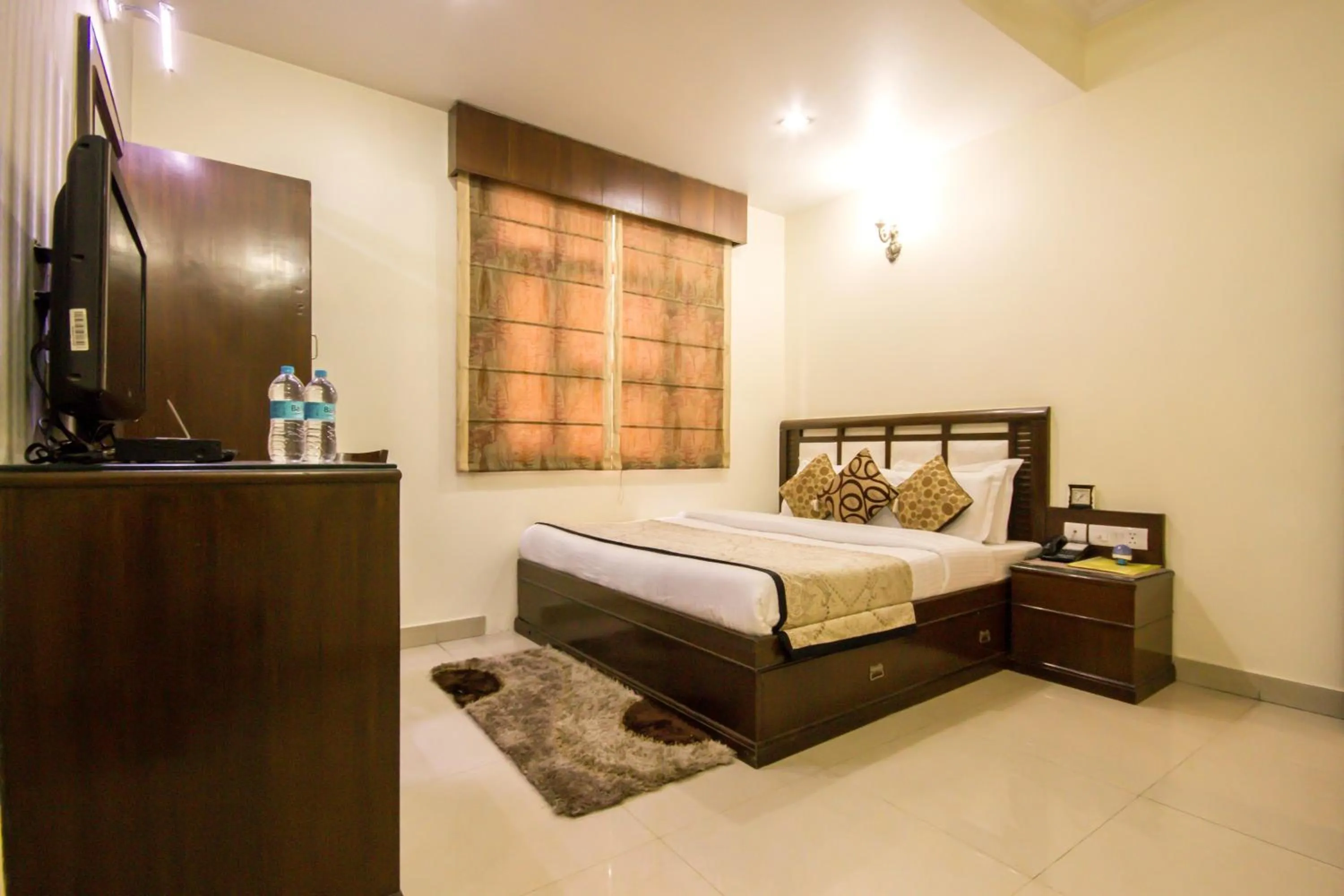 Bed in Hotel Grand Park Inn