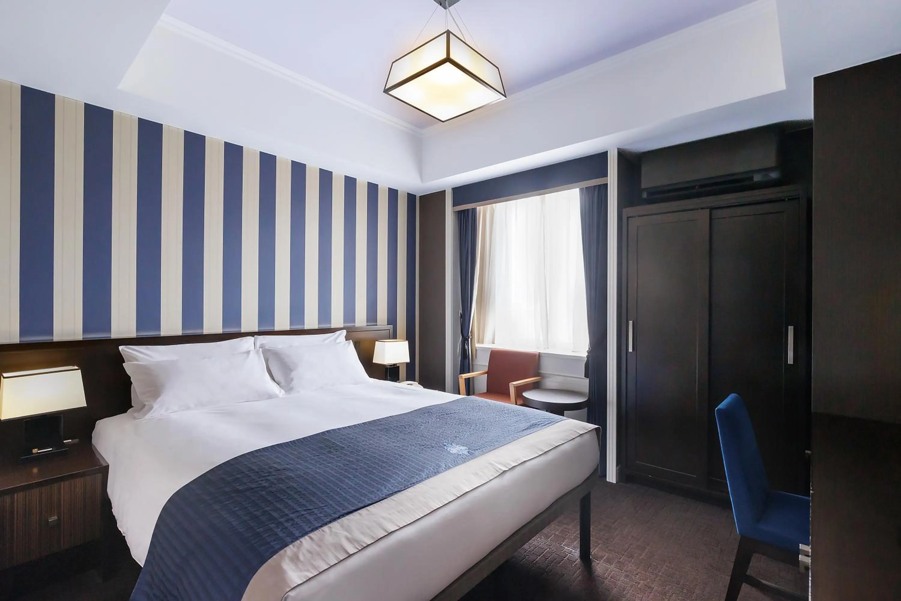 Bed in Hotel Monterey Kyoto