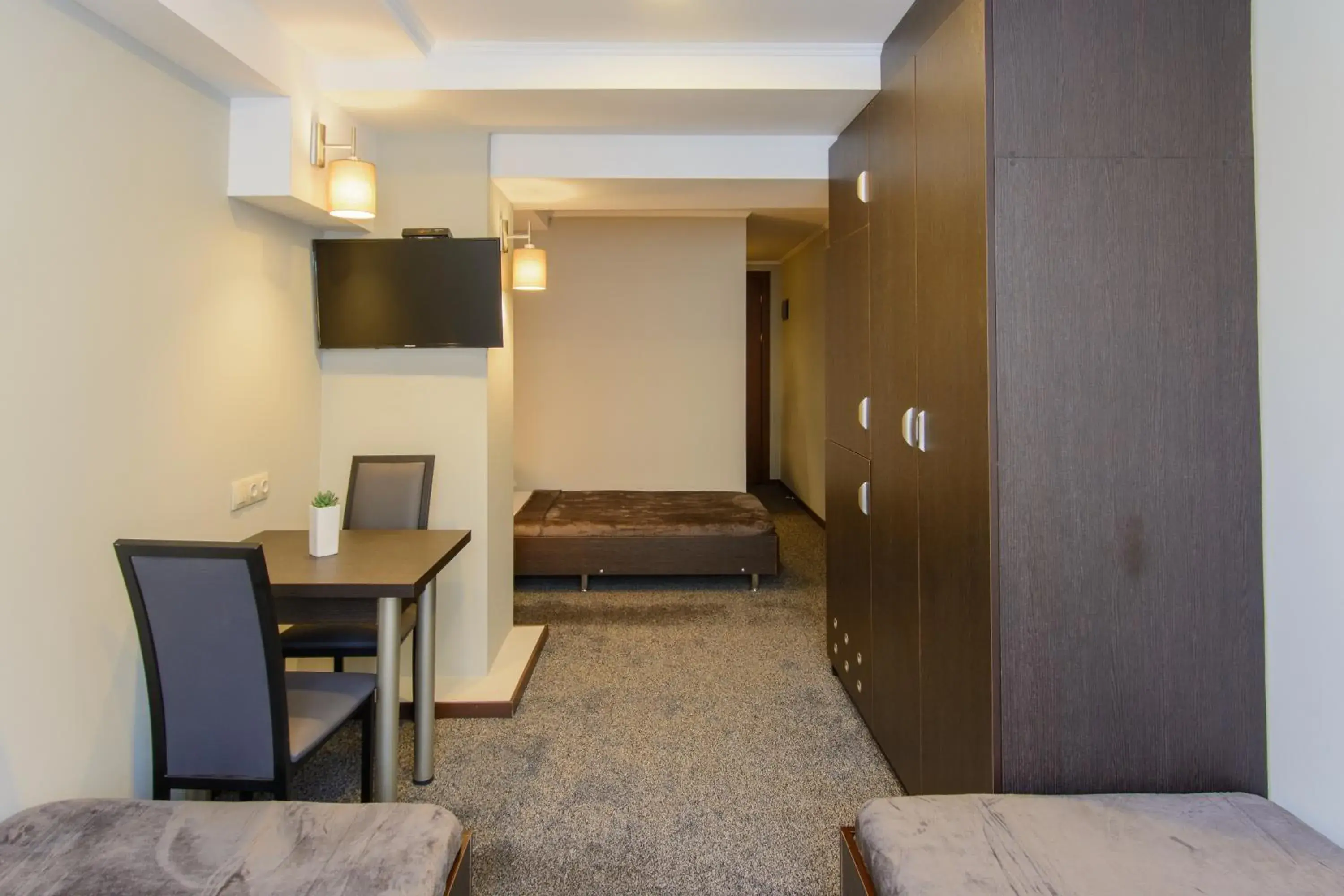 Comfort Triple Room with Shower in Hotel Reverence Comfort Triple Room with Shower in Hotel Reverence