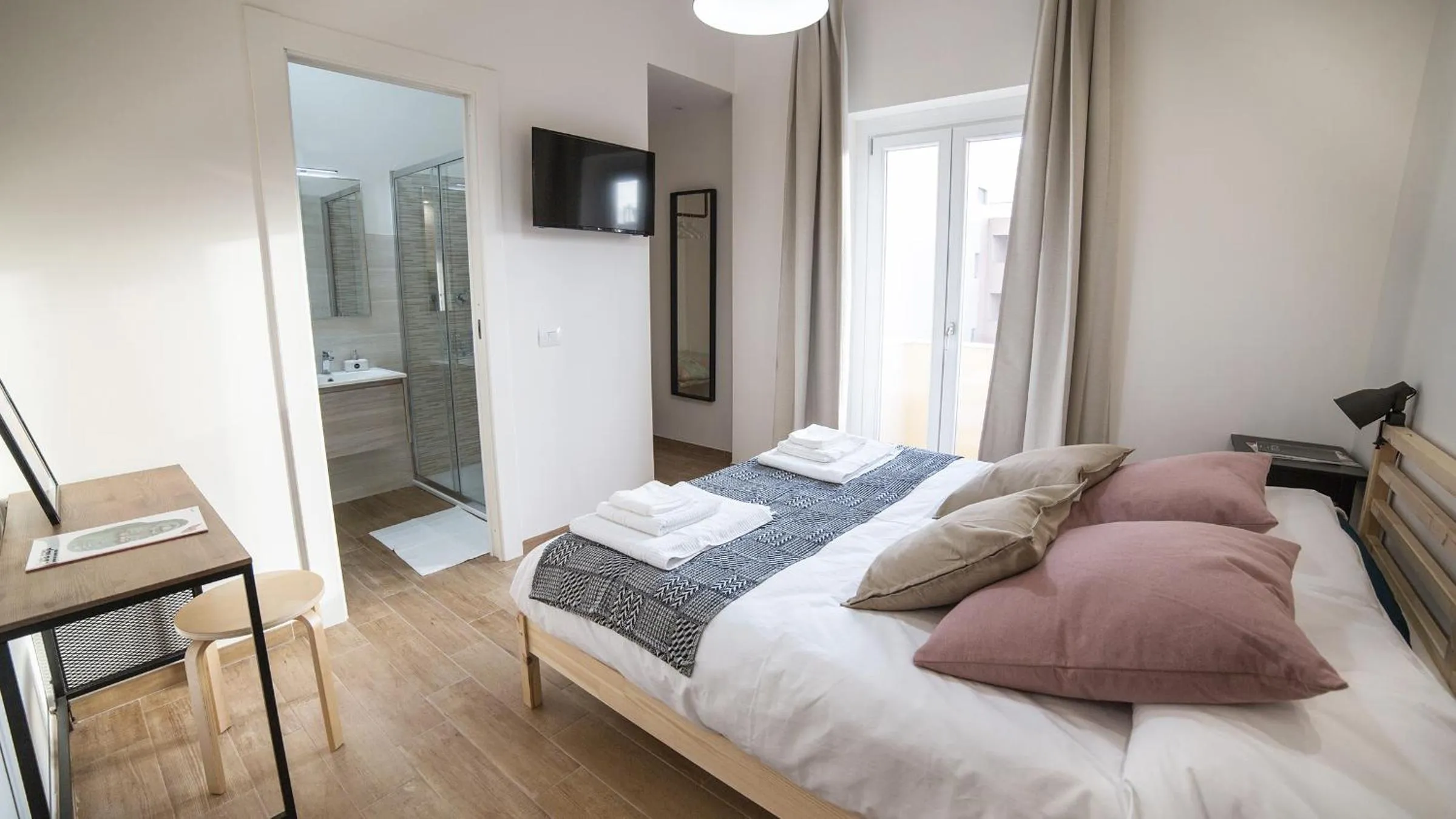 Bed in Cramu Bed&Breakfast