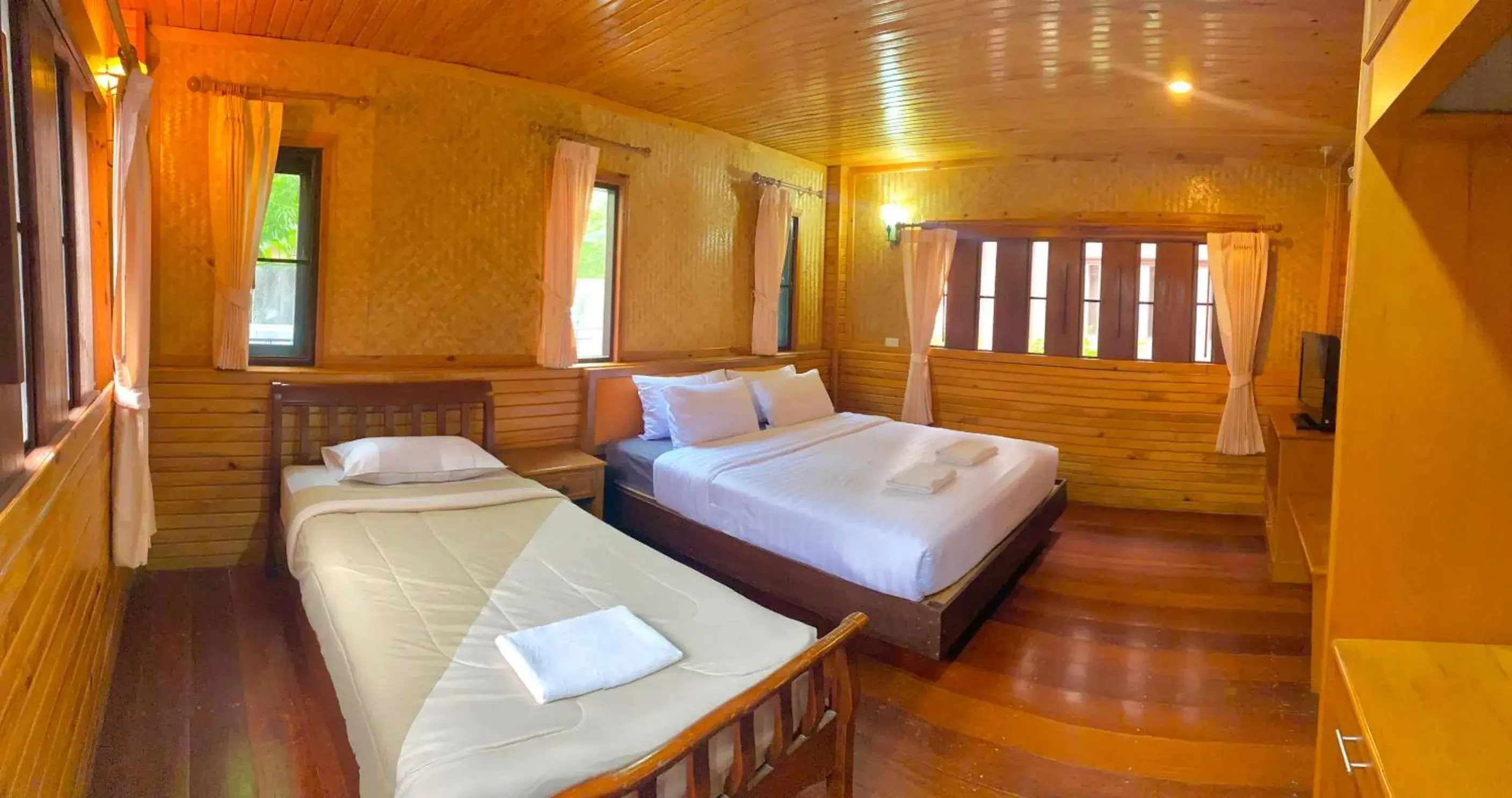 Bed in Baan Soontree Resort Bed in Baan Soontree Resort