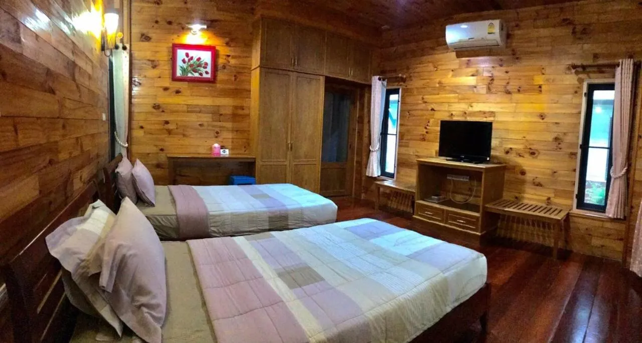 Bed in Baan Soontree Resort