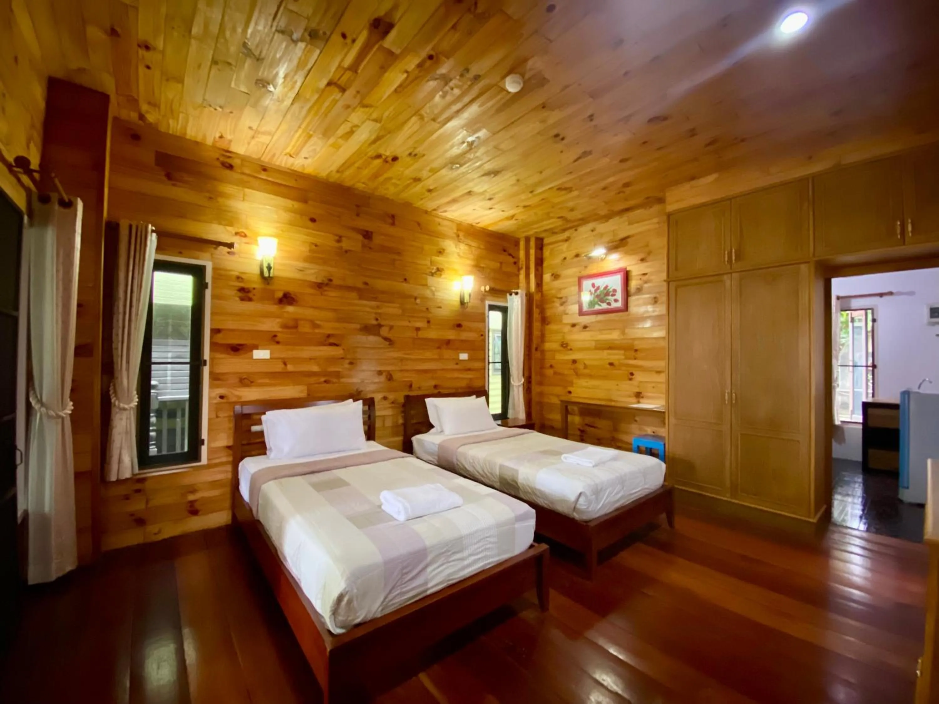 Bed in Baan Soontree Resort
