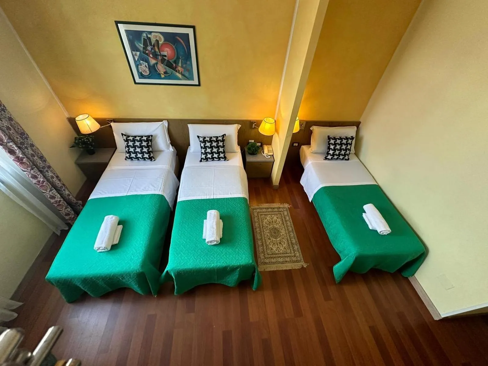 Bed in Hotel Raffaello Venice