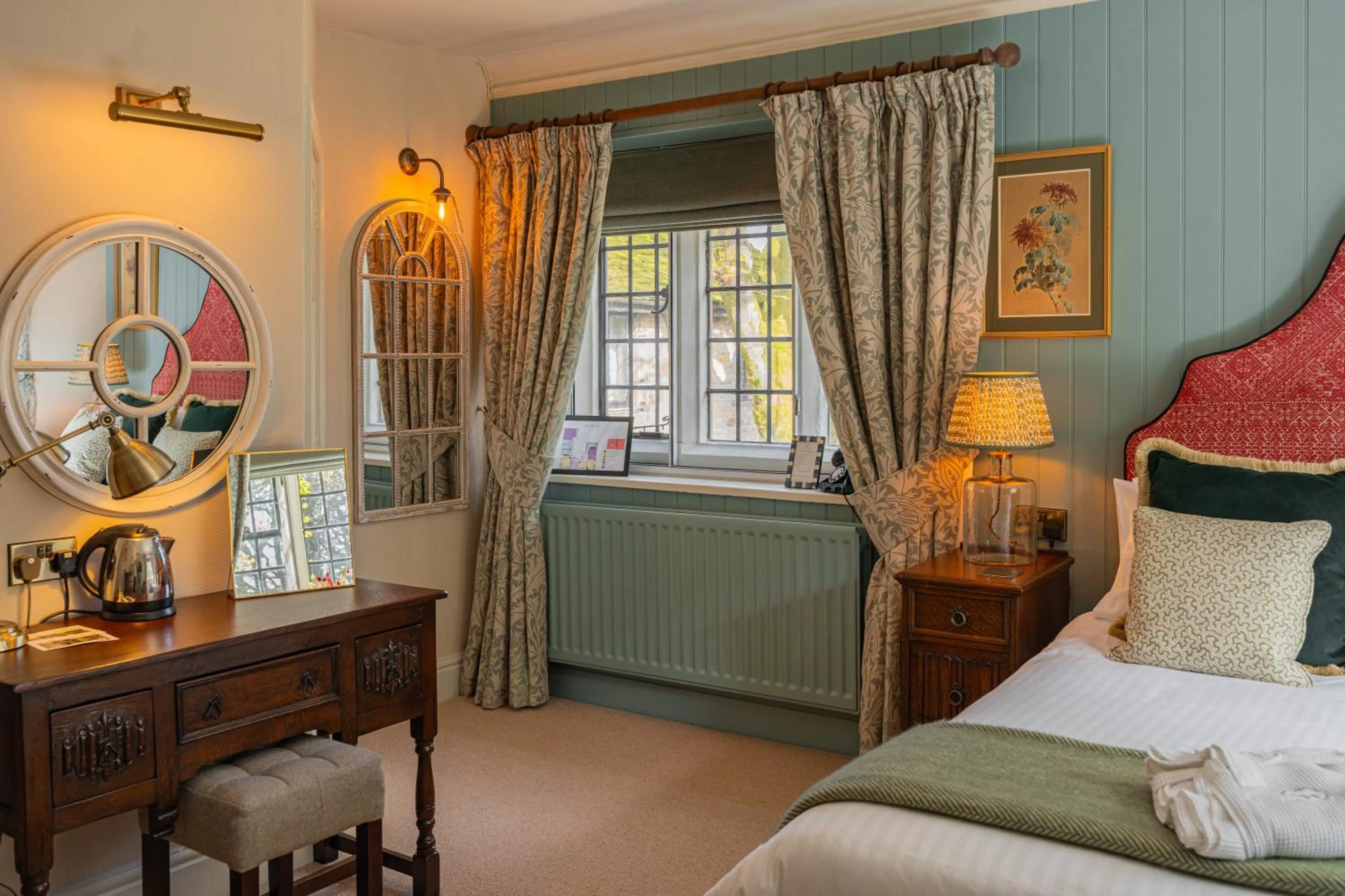 Bed in Stone House Hotel