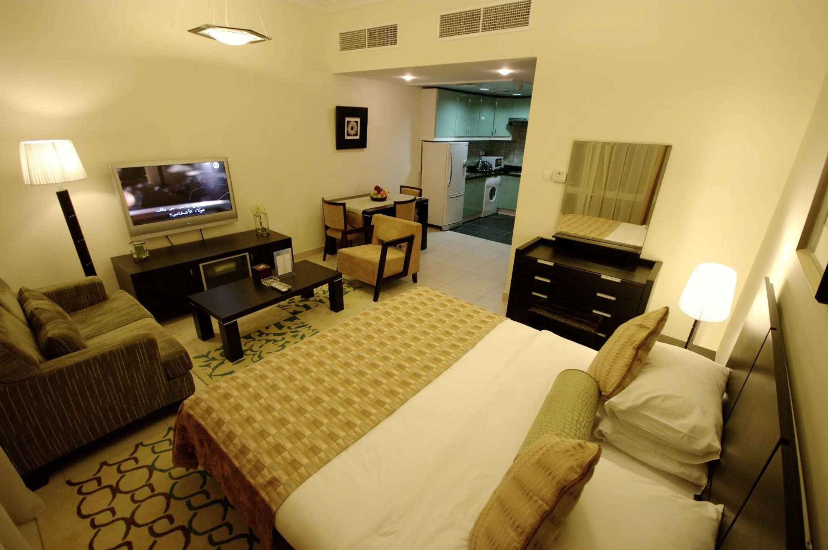 Bed in Gulf Oasis Hotel Apartments Fz LLC