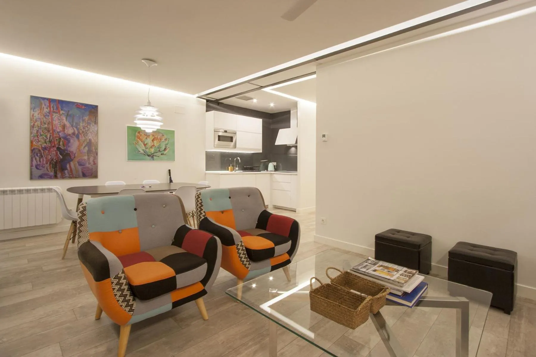 Dining area in Ku by Oldtown San Sebastian apartments