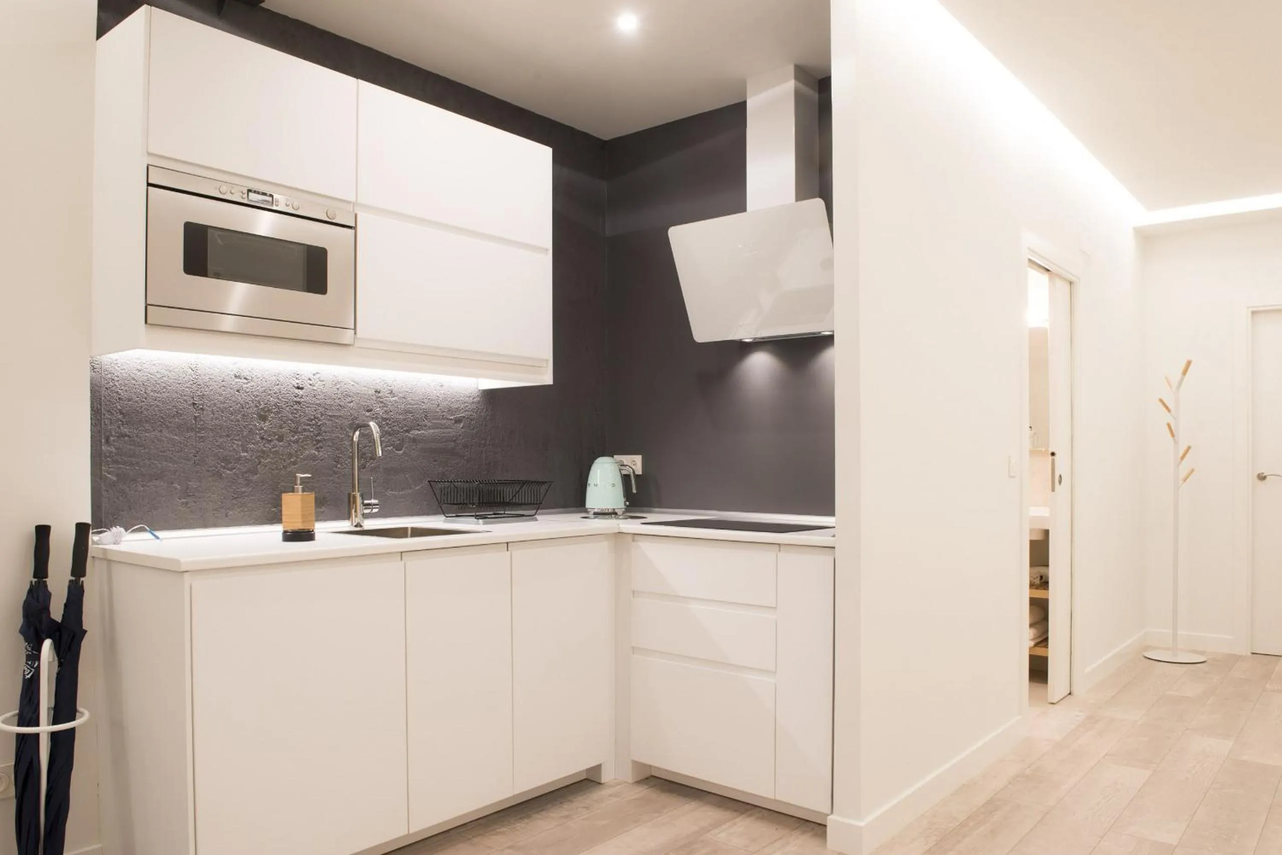 Kitchen or kitchenette in Ku by Oldtown San Sebastian apartments