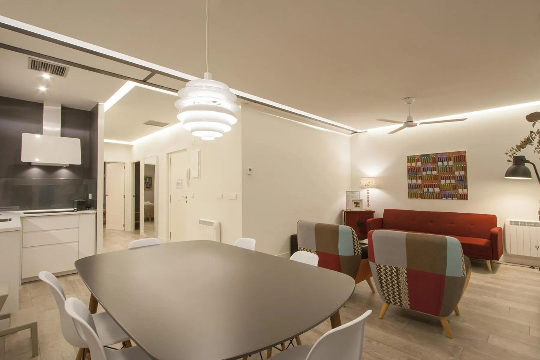 Dining area in Ku by Oldtown San Sebastian apartments