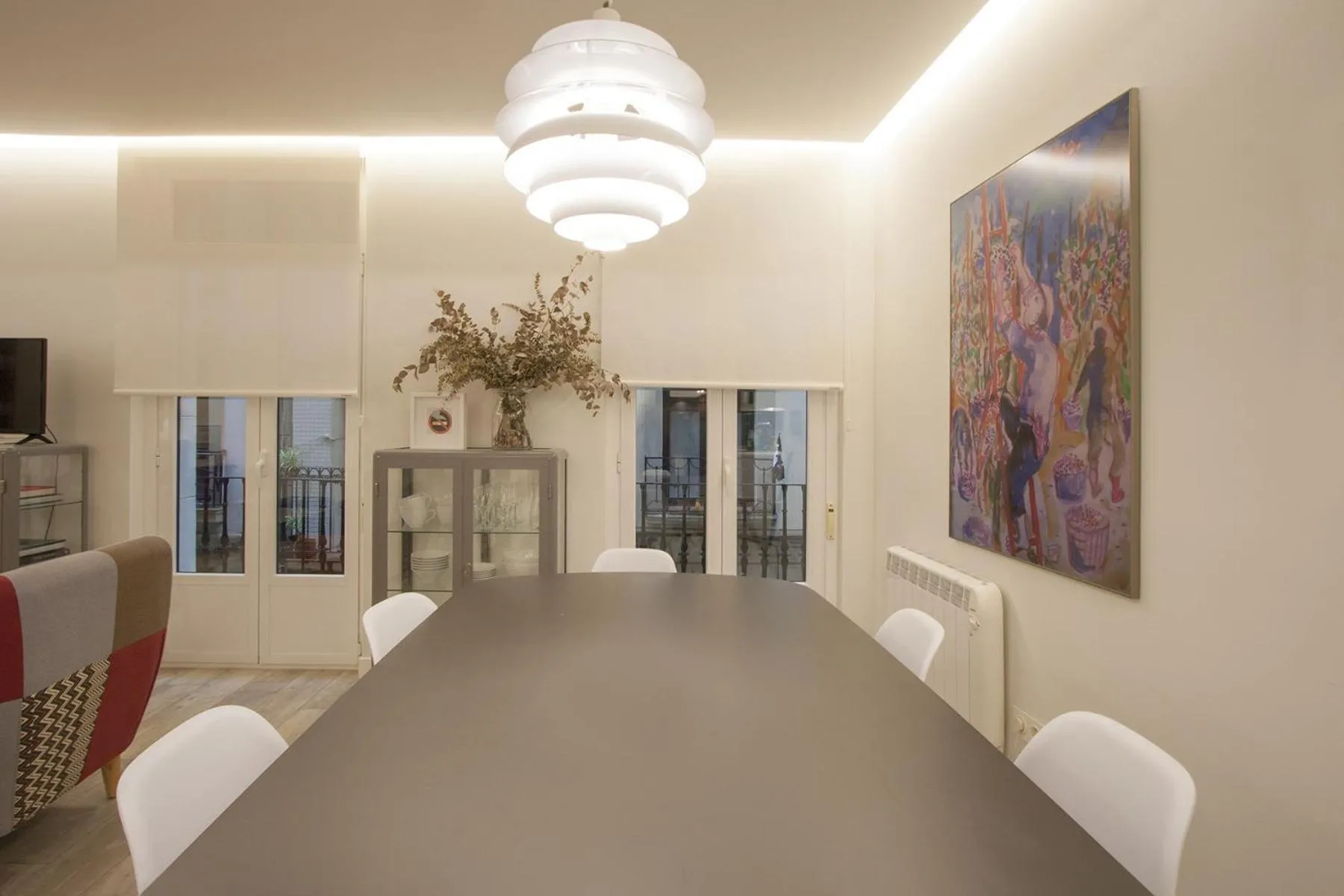 Dining area in Ku by Oldtown San Sebastian apartments