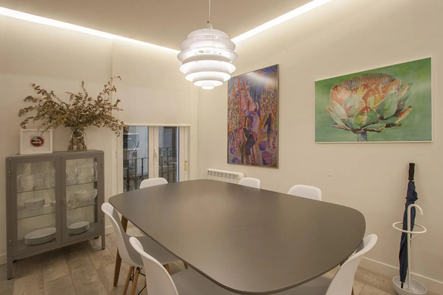 Dining area in Ku by Oldtown San Sebastian apartments