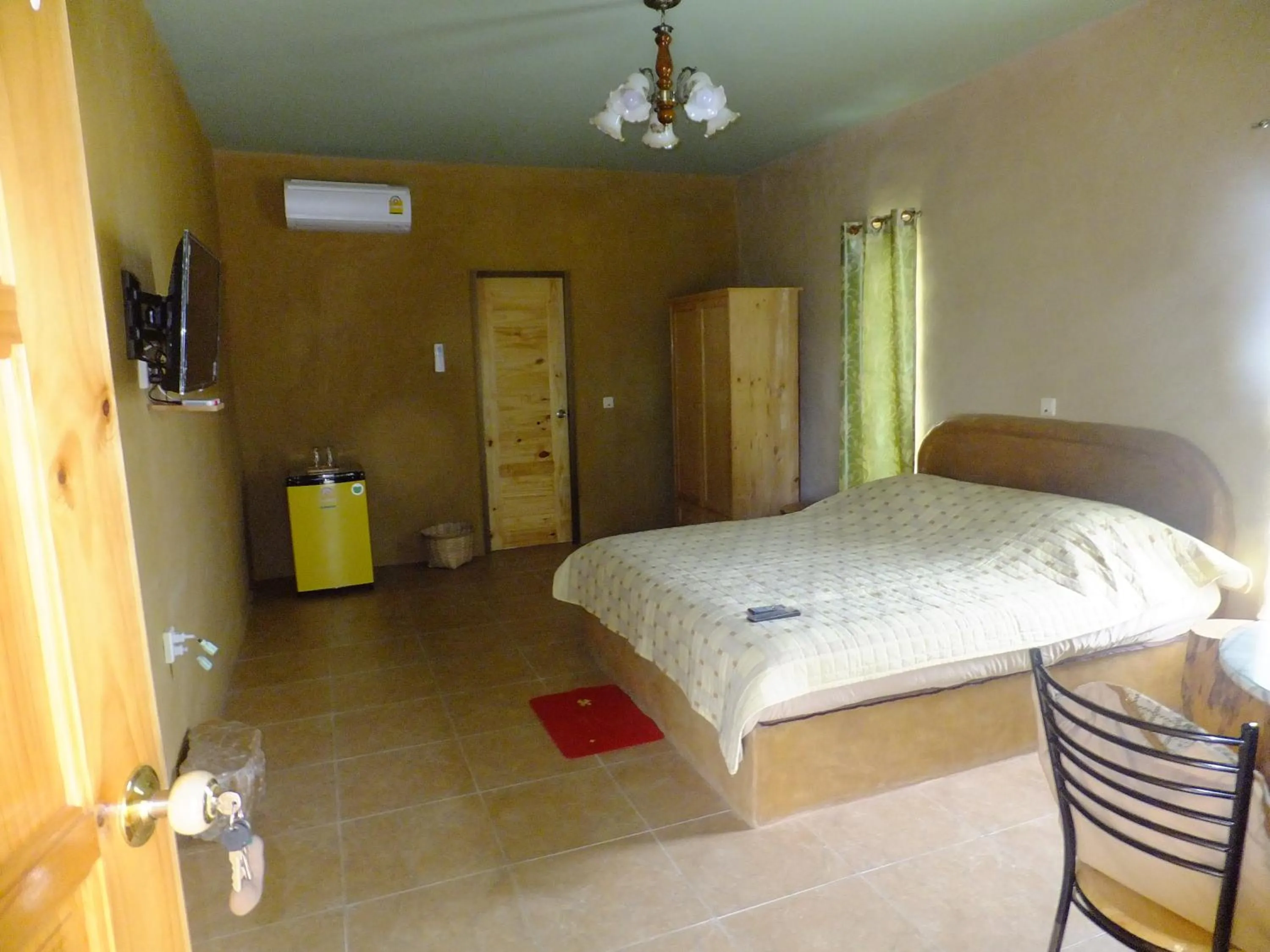 Photo of the whole room, Bed in Baandin resort