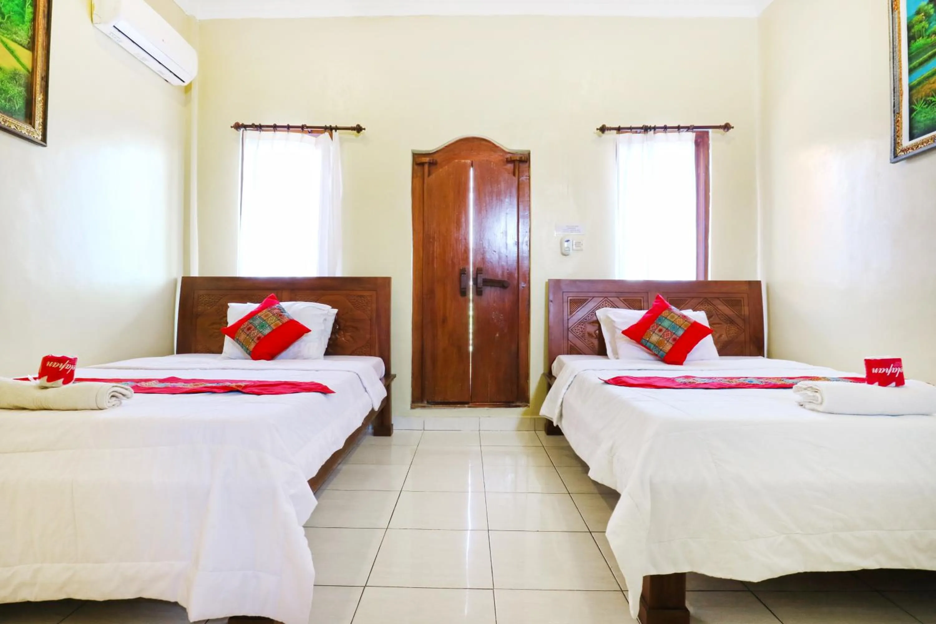 Bed in Jungut Guest House Ubud