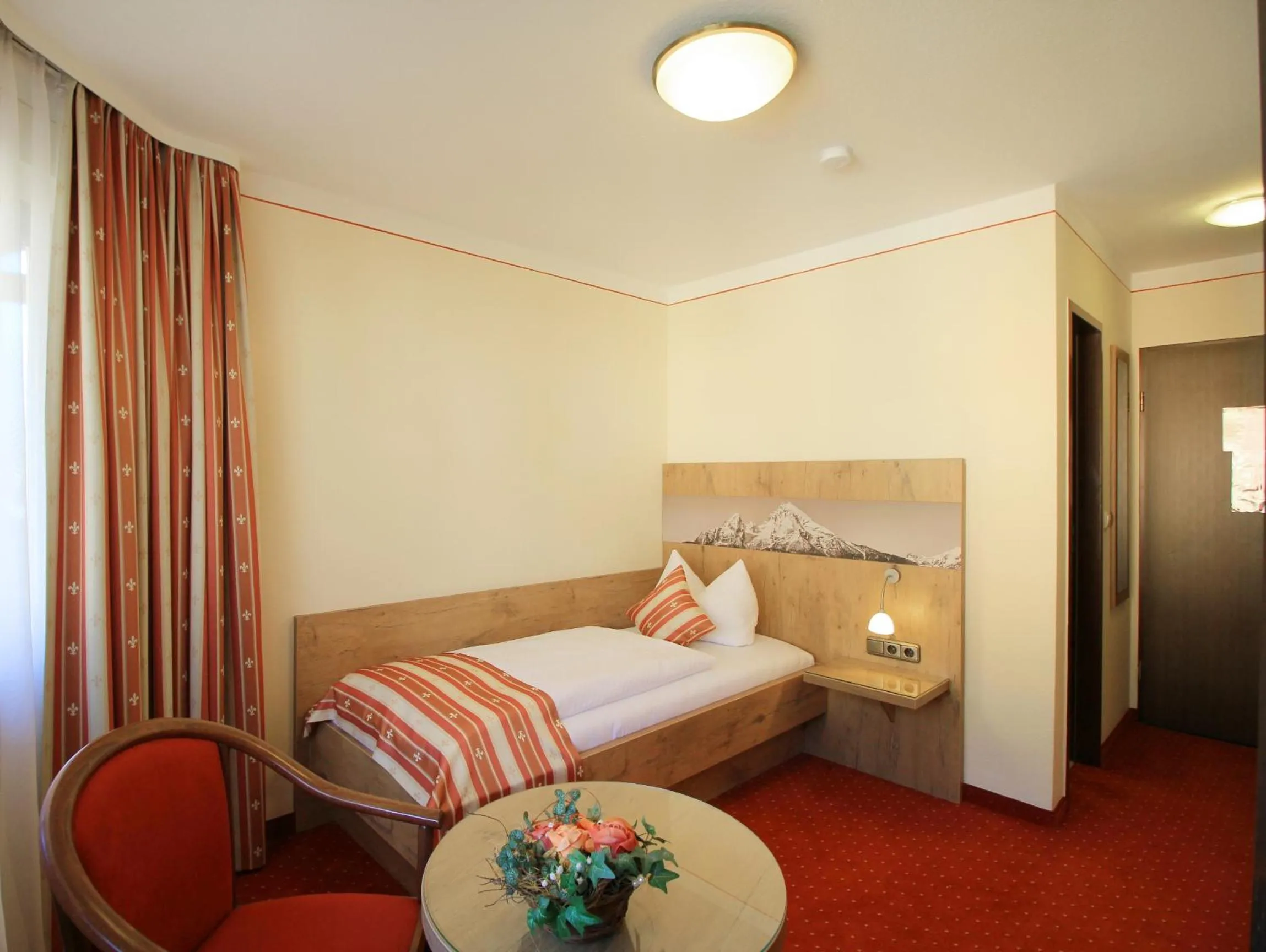 Bed in Alpenhotel Brennerbascht