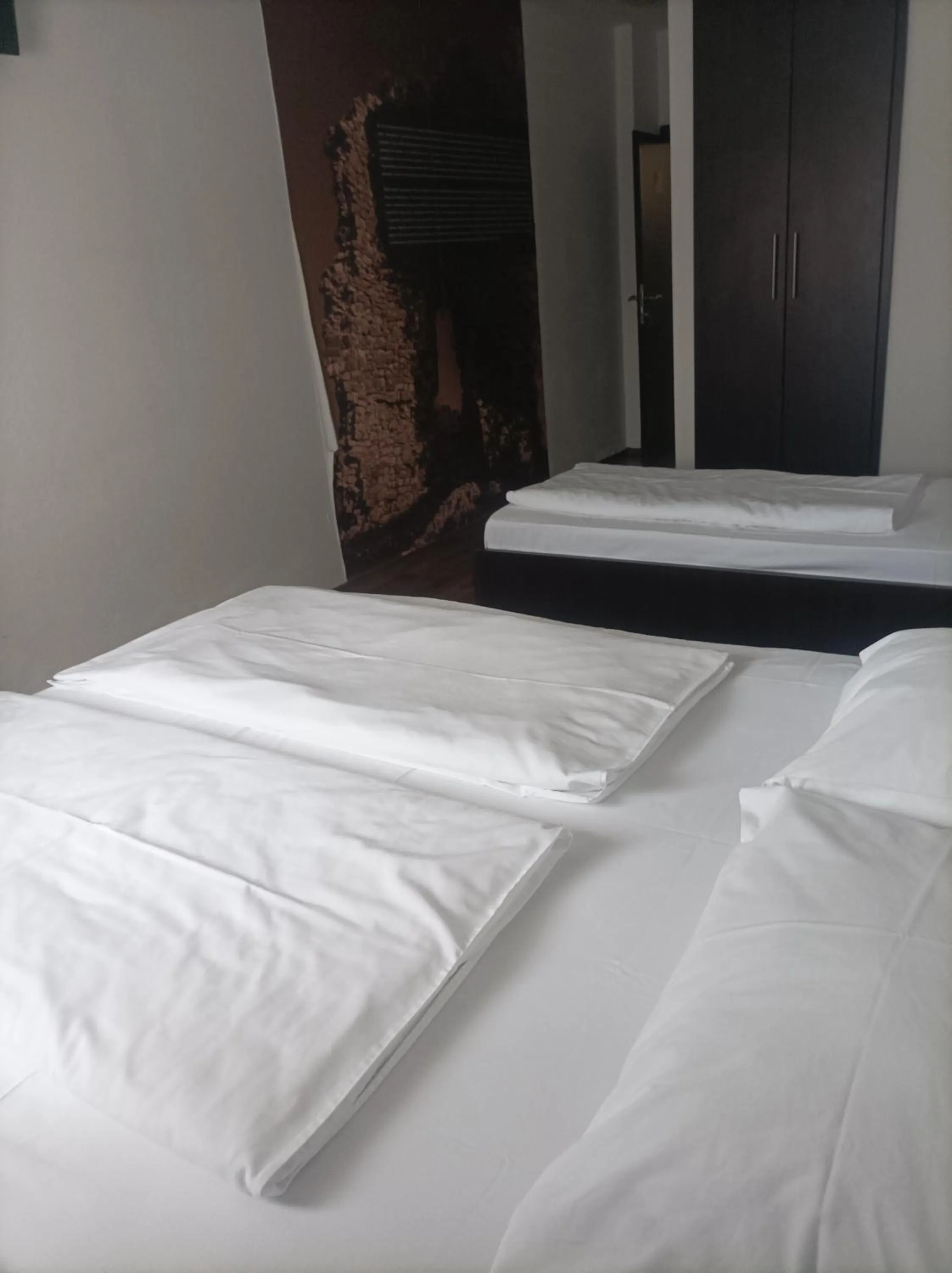 Property building, Bed in Hotel Storia