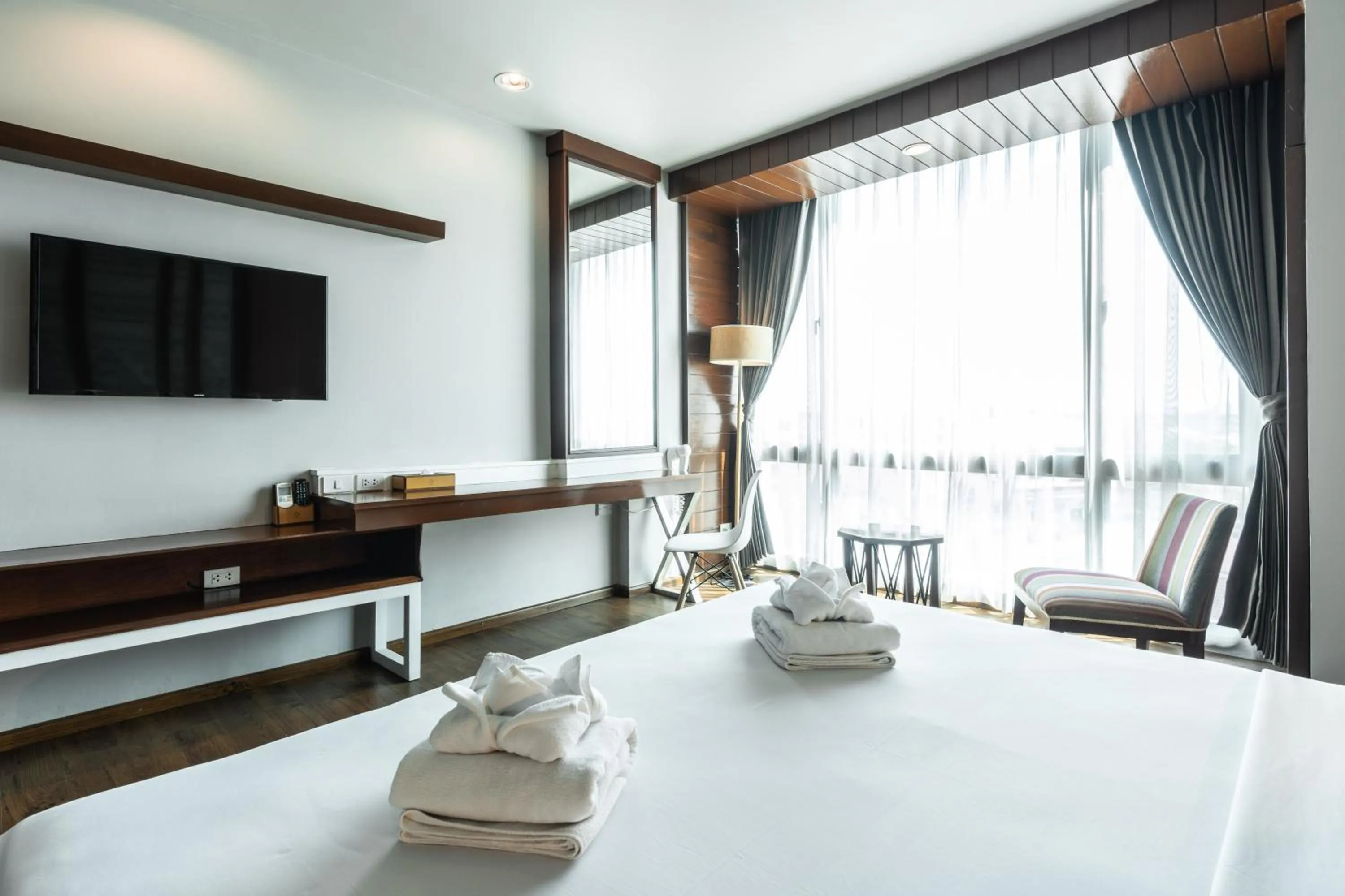 Photo of the whole room, Bed in Grand Hotel Vientiane