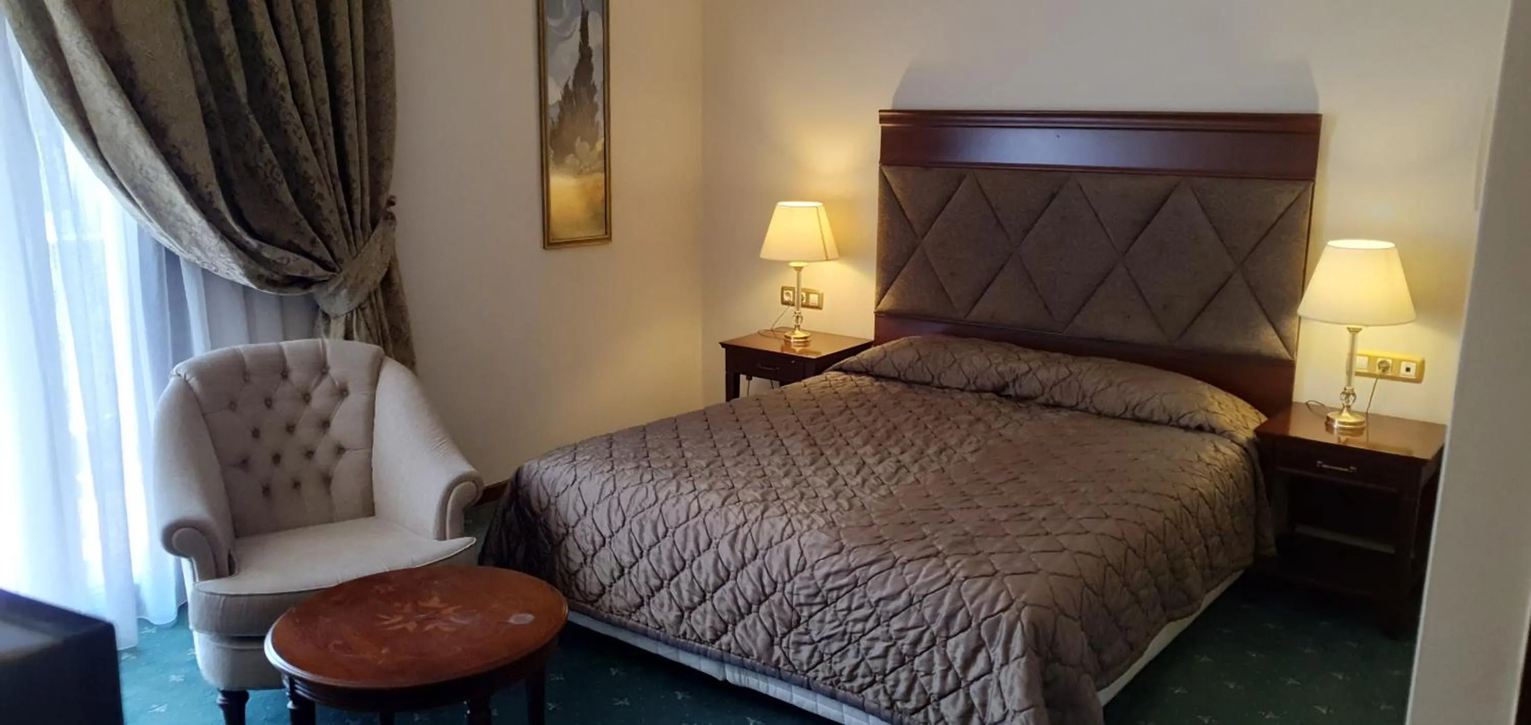 Bed in Aeton Melathron Hotel