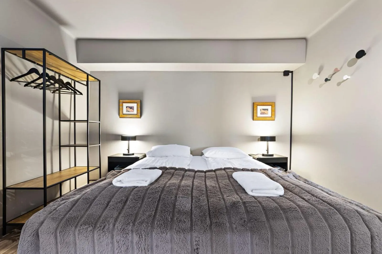 Bed in Astro Apartments