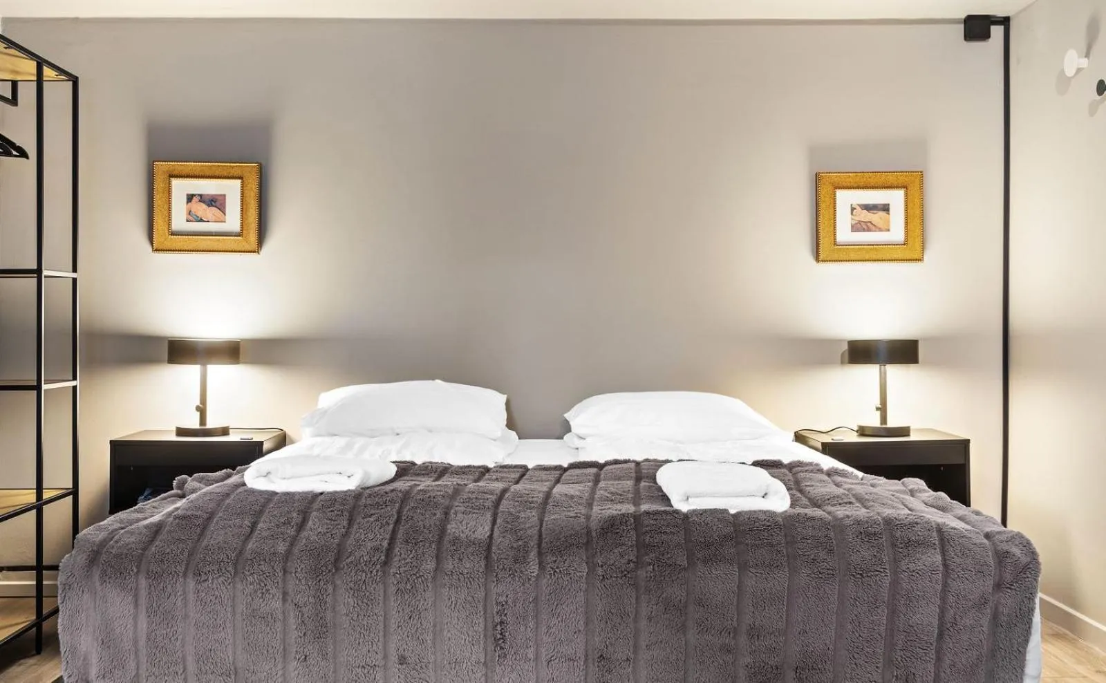 Bed in Astro Apartments