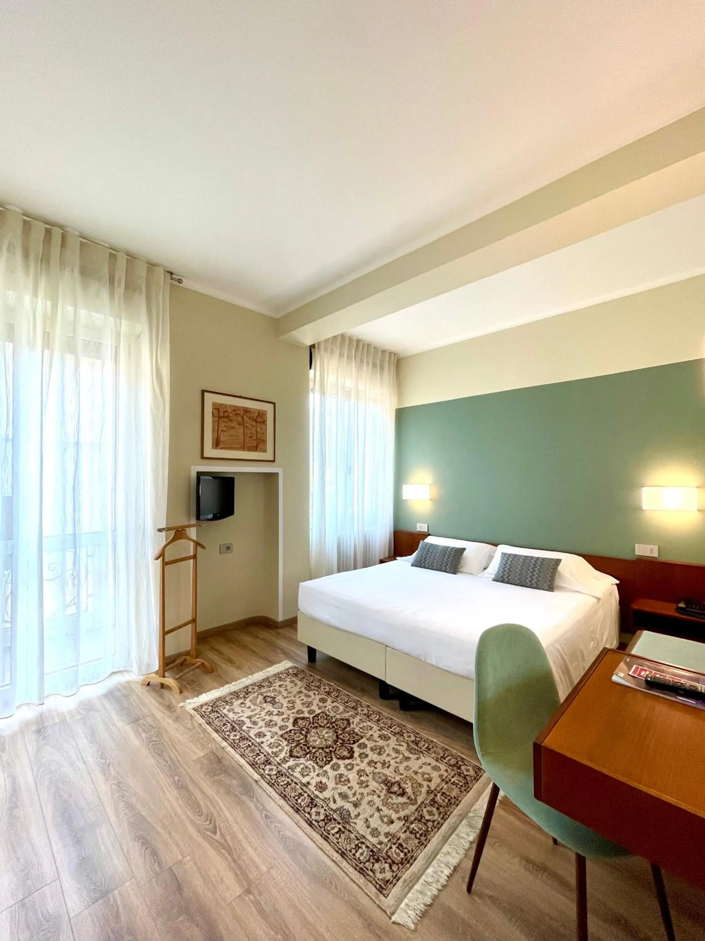 Photo of the whole room, Bed in Hotel Brescia