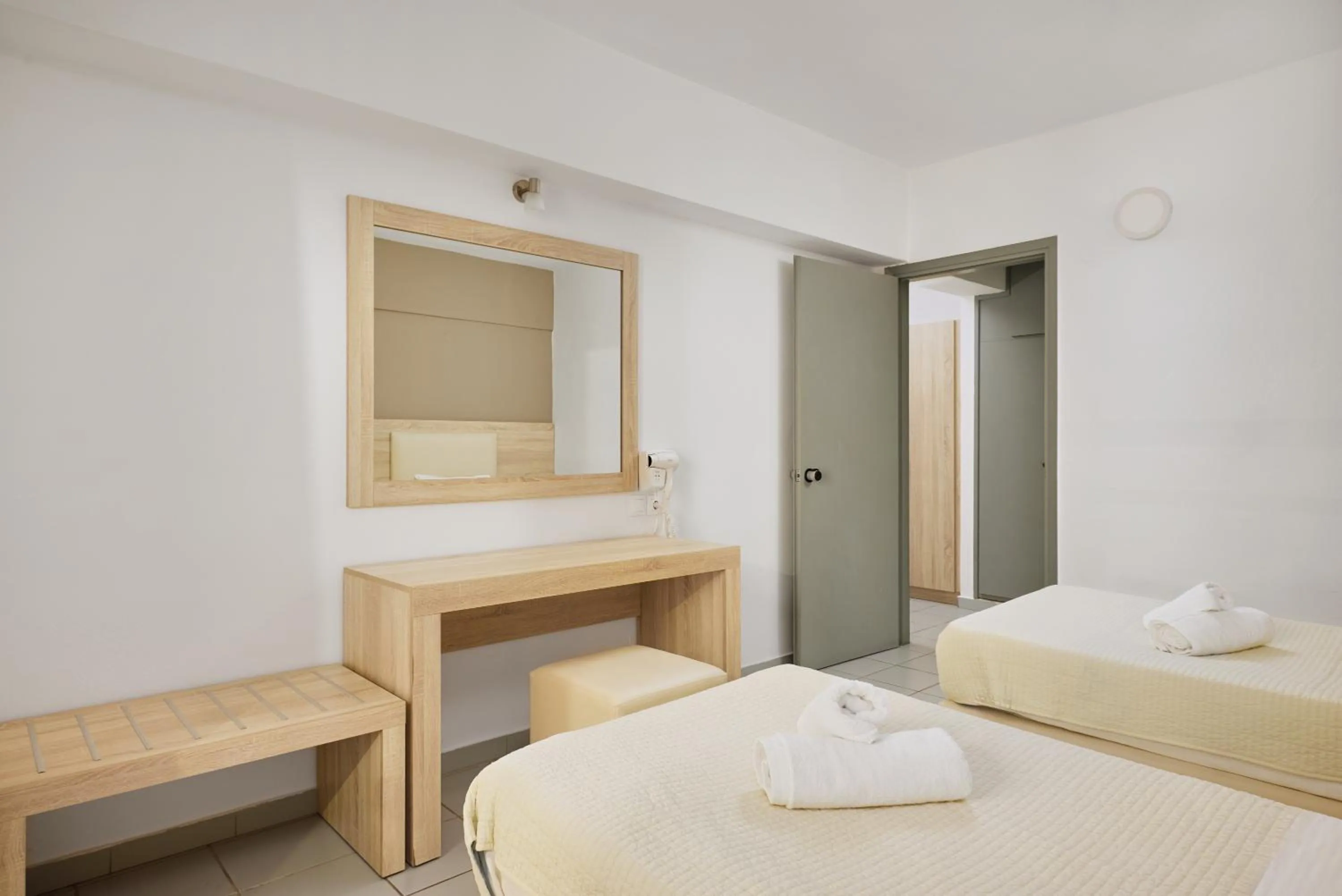 Bed in Acropolis Apartments
