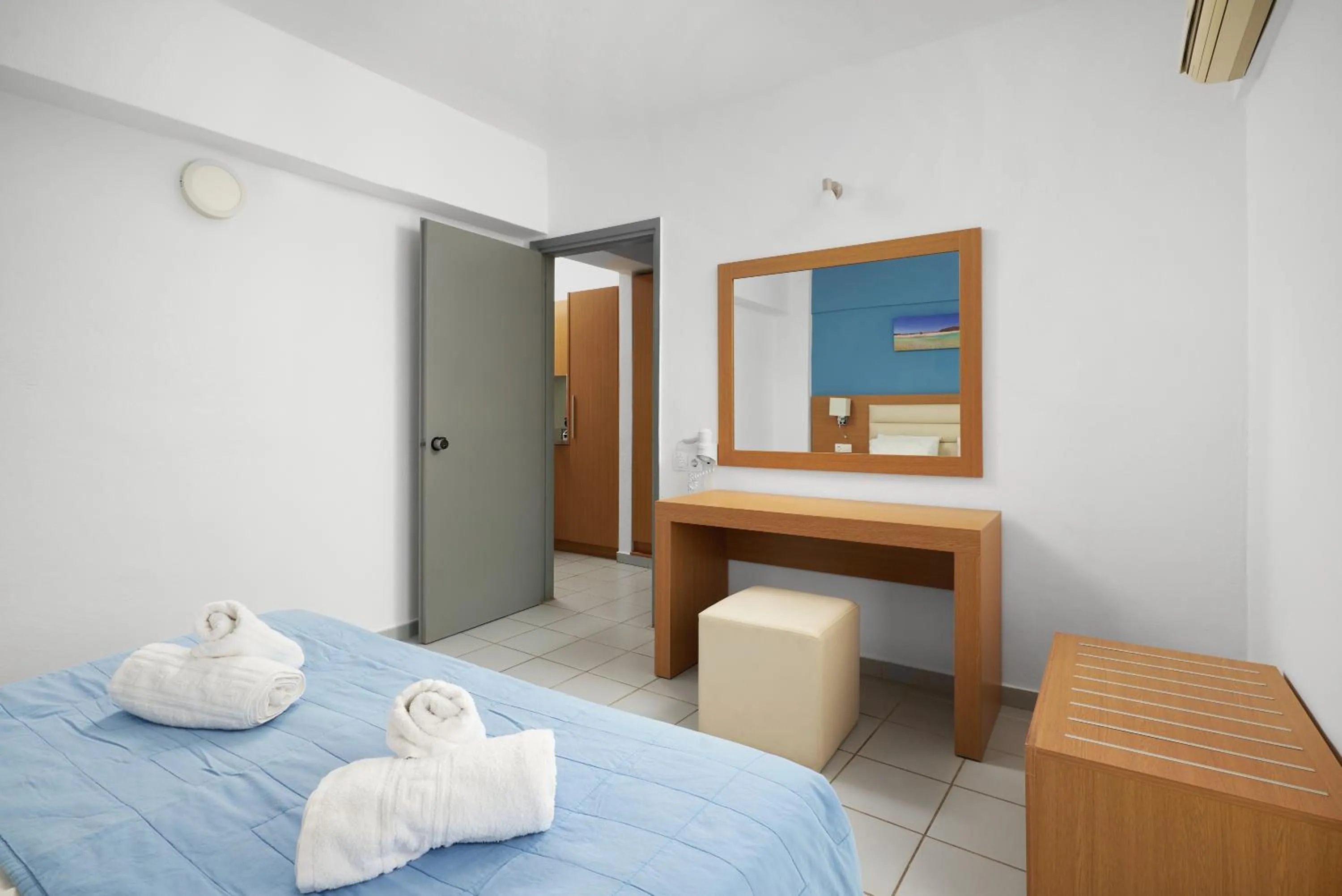 Bed in Acropolis Apartments