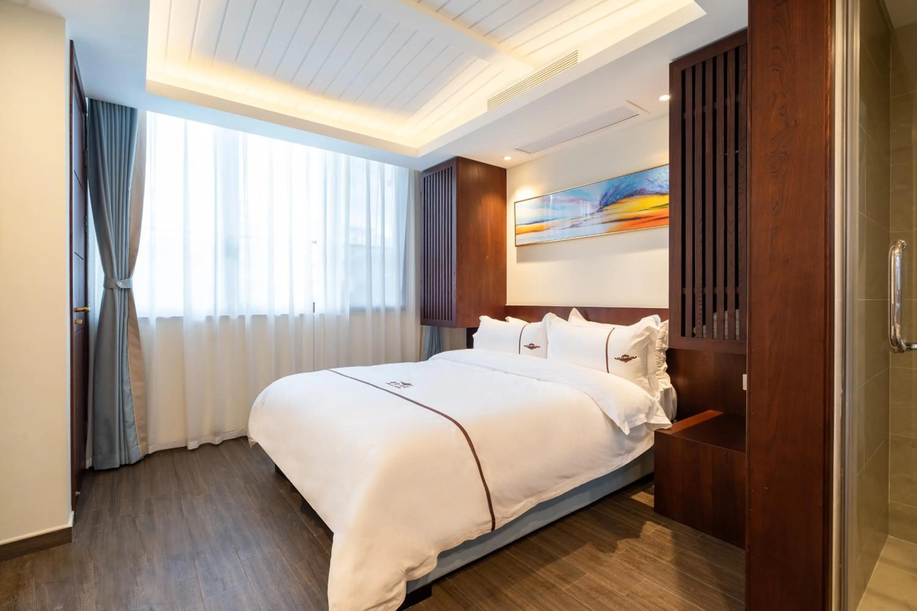 Bed in Iccssi Villa Haitang Bay Sanya