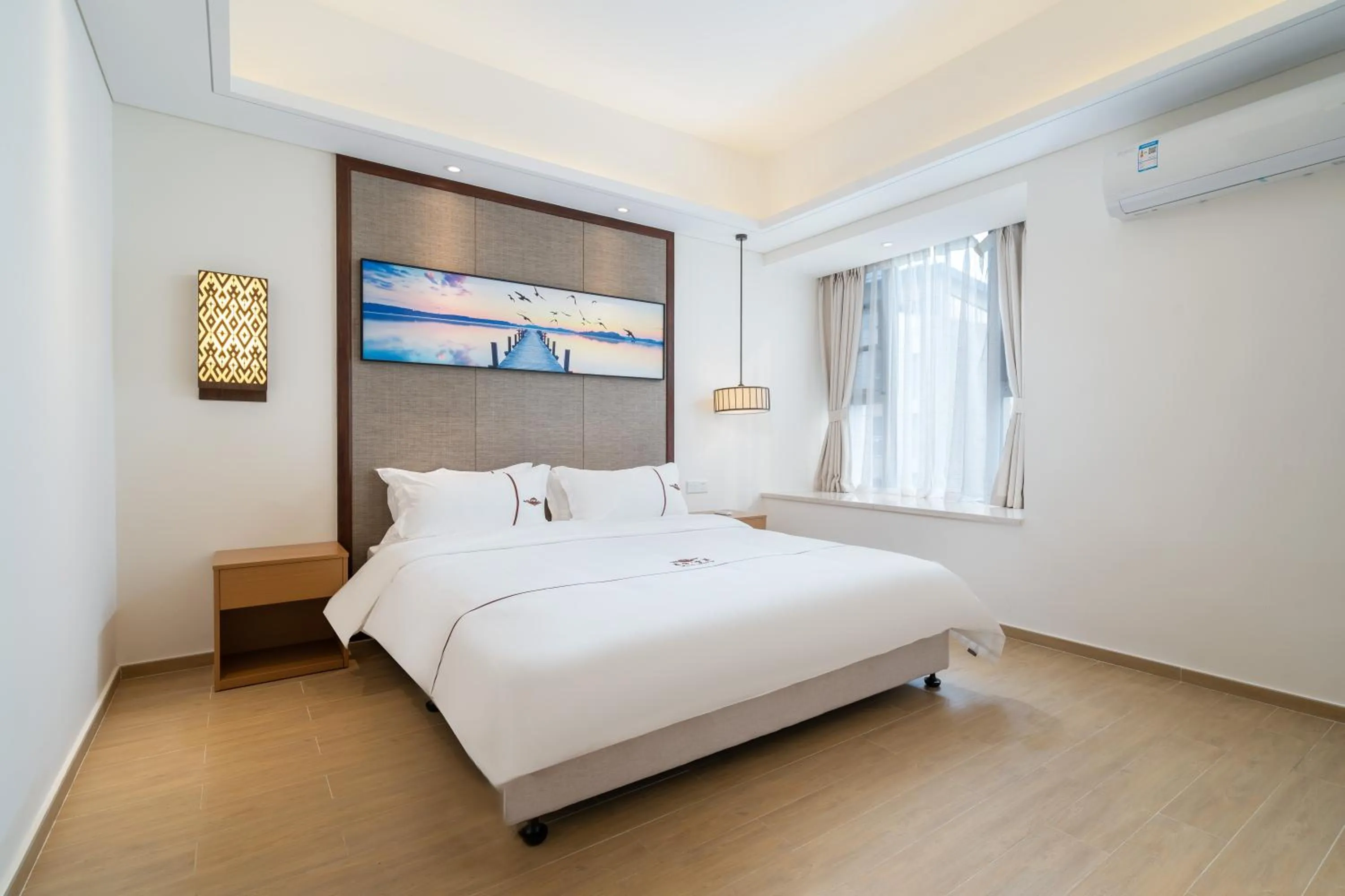 Bed in Iccssi Villa Haitang Bay Sanya