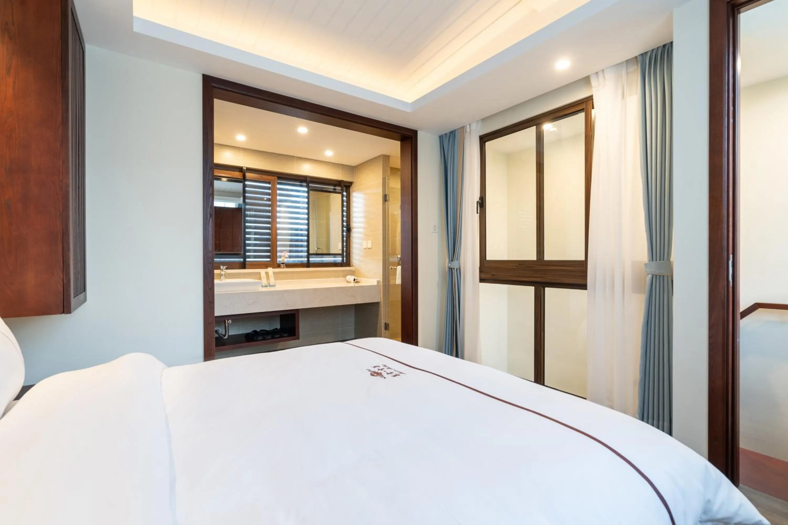 Bed in Iccssi Villa Haitang Bay Sanya