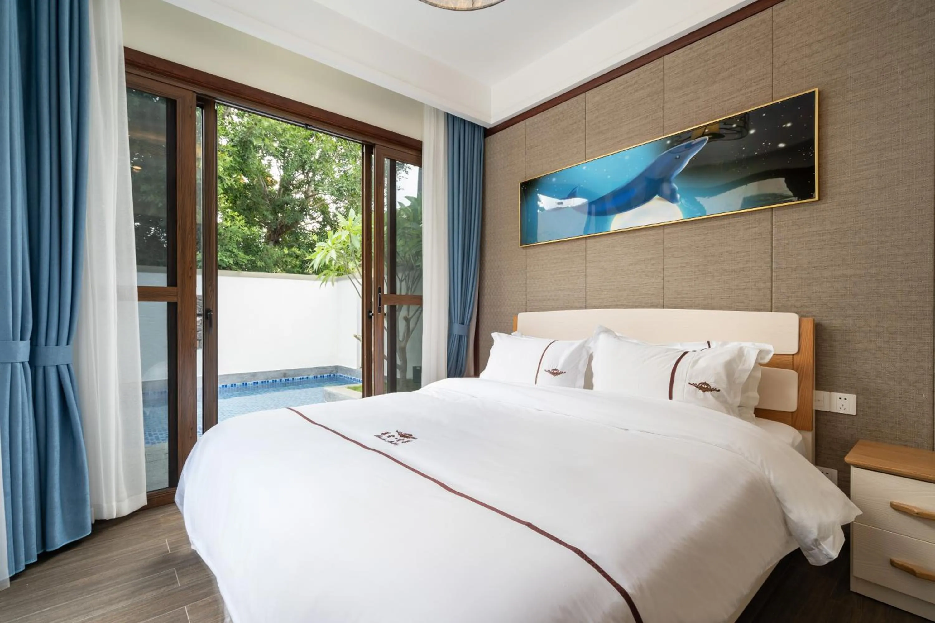 Bed in Iccssi Villa Haitang Bay Sanya