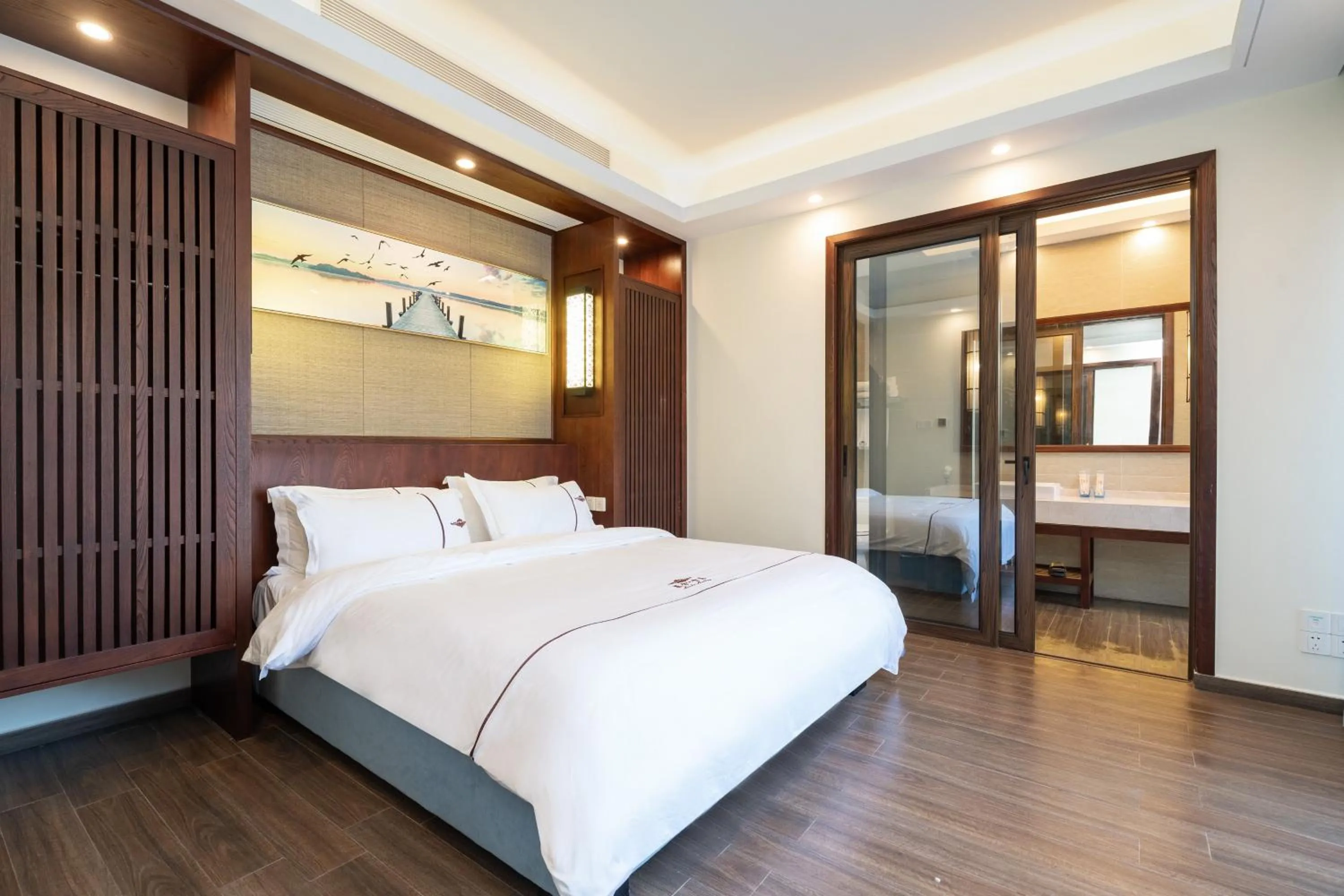 Bed in Iccssi Villa Haitang Bay Sanya