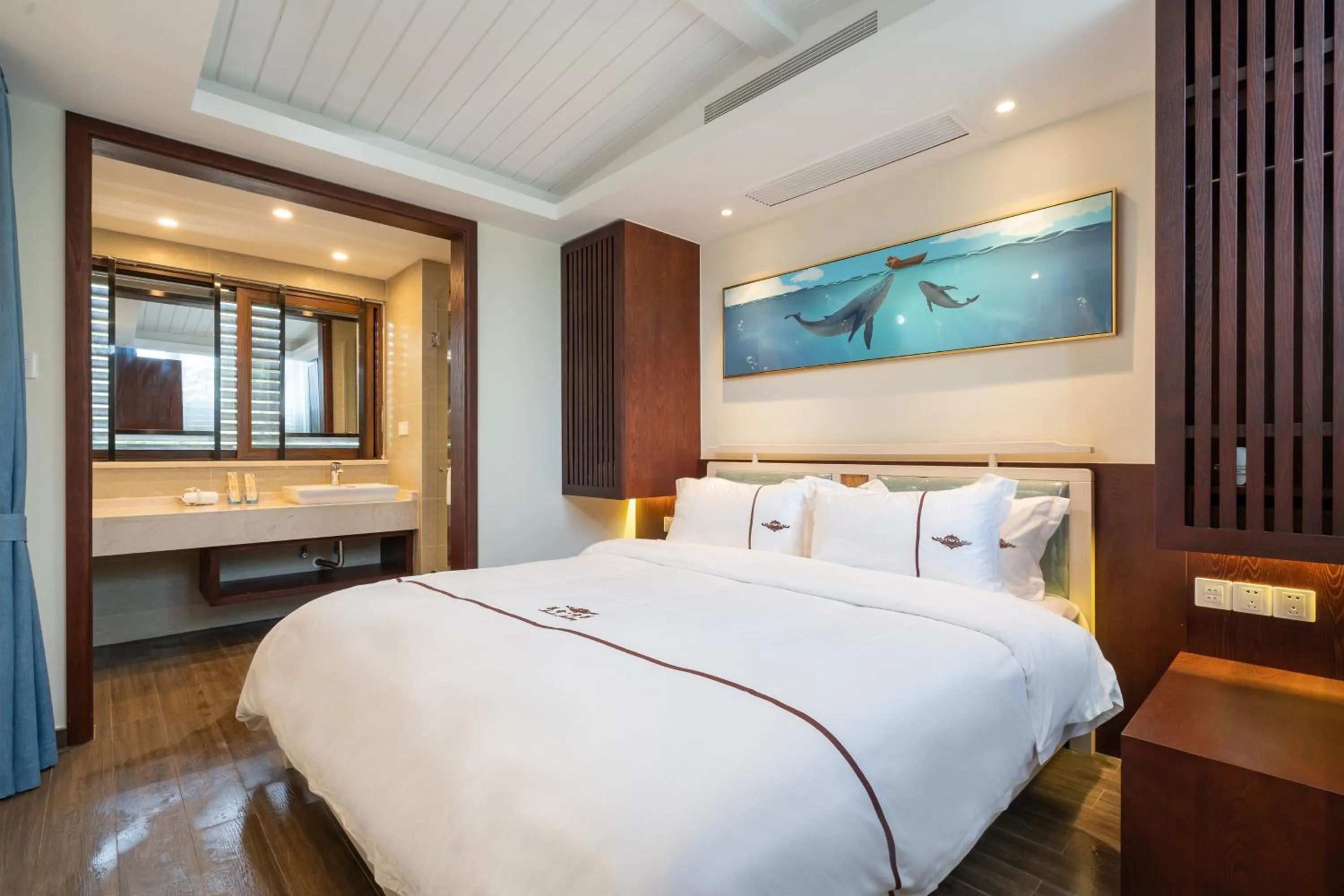Bed in Iccssi Villa Haitang Bay Sanya