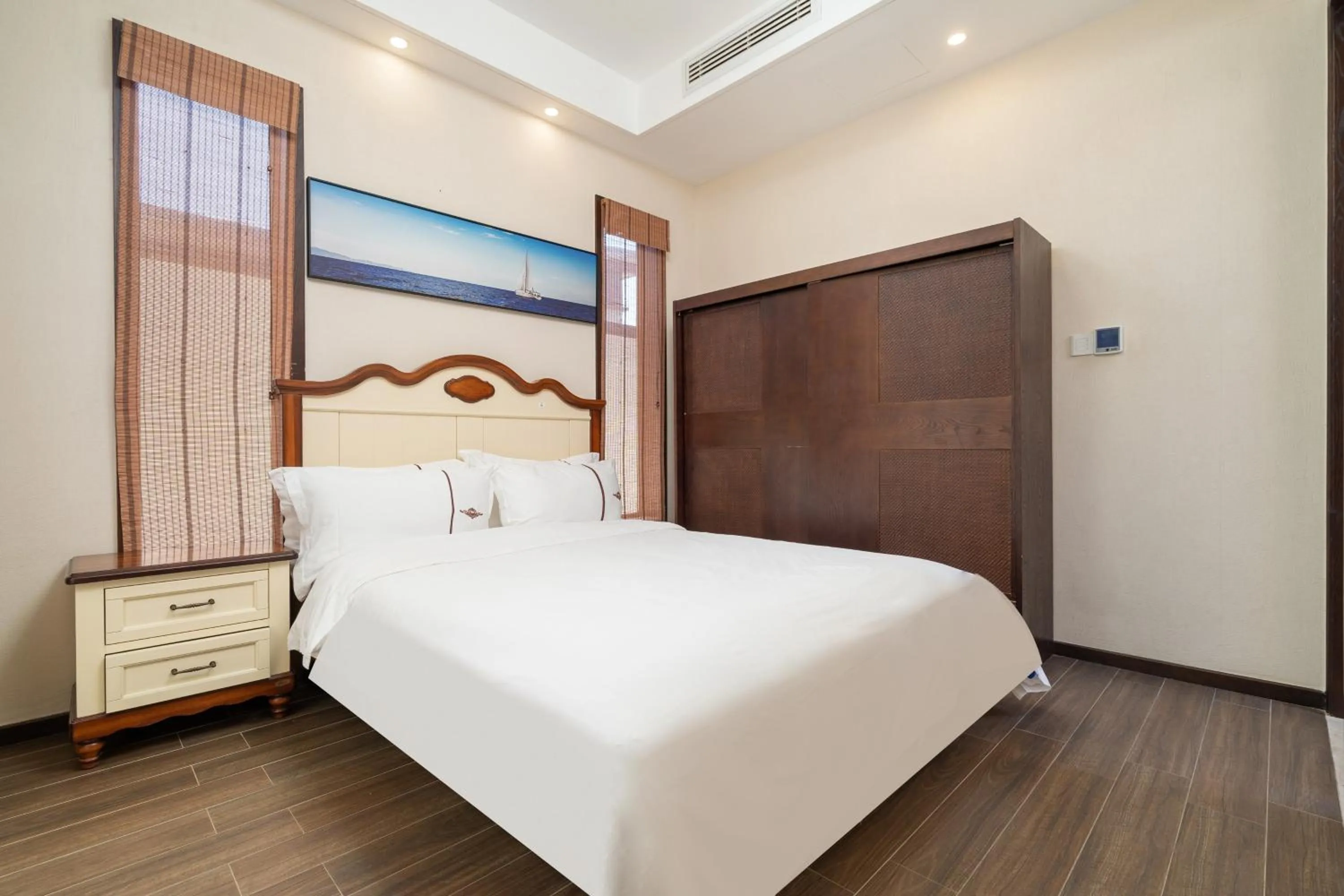 Bed in Iccssi Villa Haitang Bay Sanya